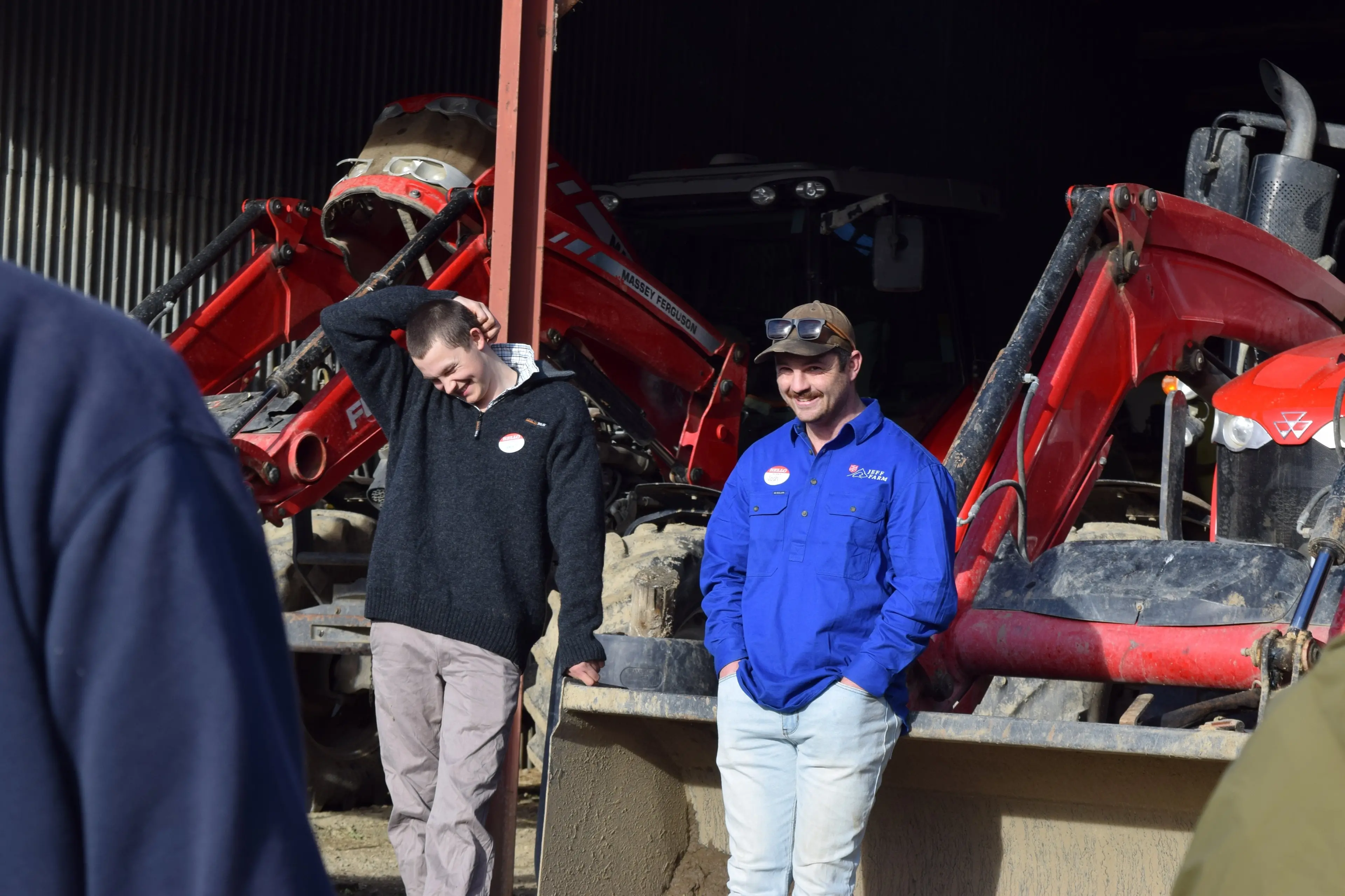 Jeff Farm cadet James Read (left), 18, of Oamaru and\\u00A0 tractor driver Josh Gibson, of Gore, answer questions at a cadet open day tour stop in Eastern Southland. Photo: Shawn McAvinue\\u00A0