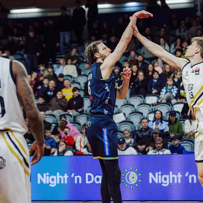 Nuggets snap losing streak in thriller