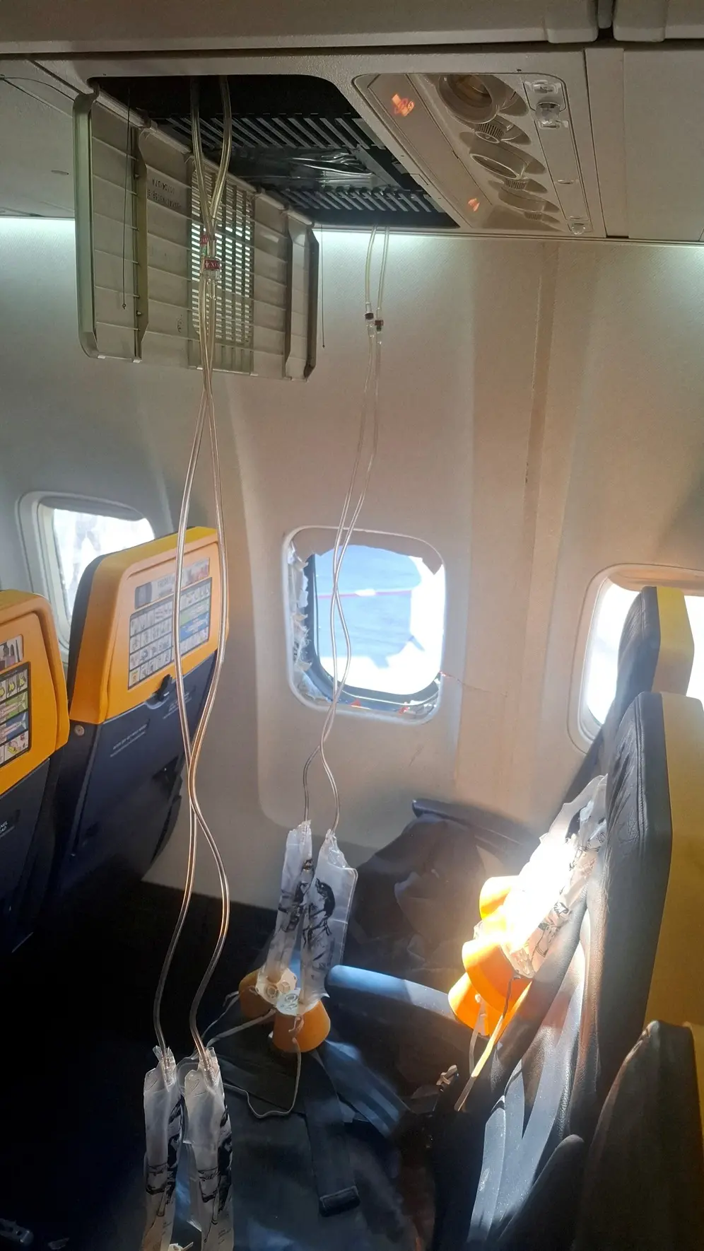 Wife recalls moment husband sucked out of plane window