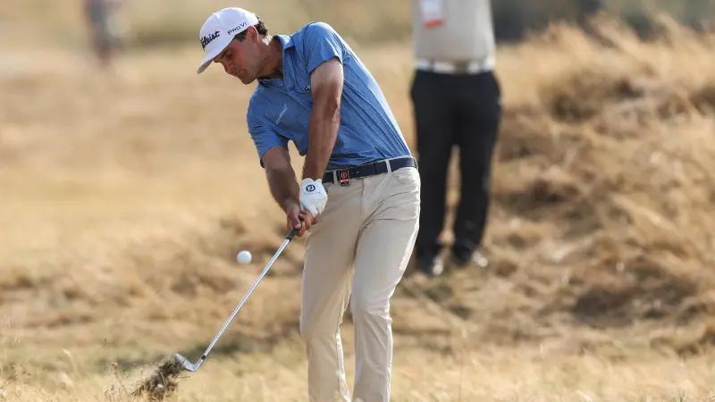 Suber stuns field to lead at the Open