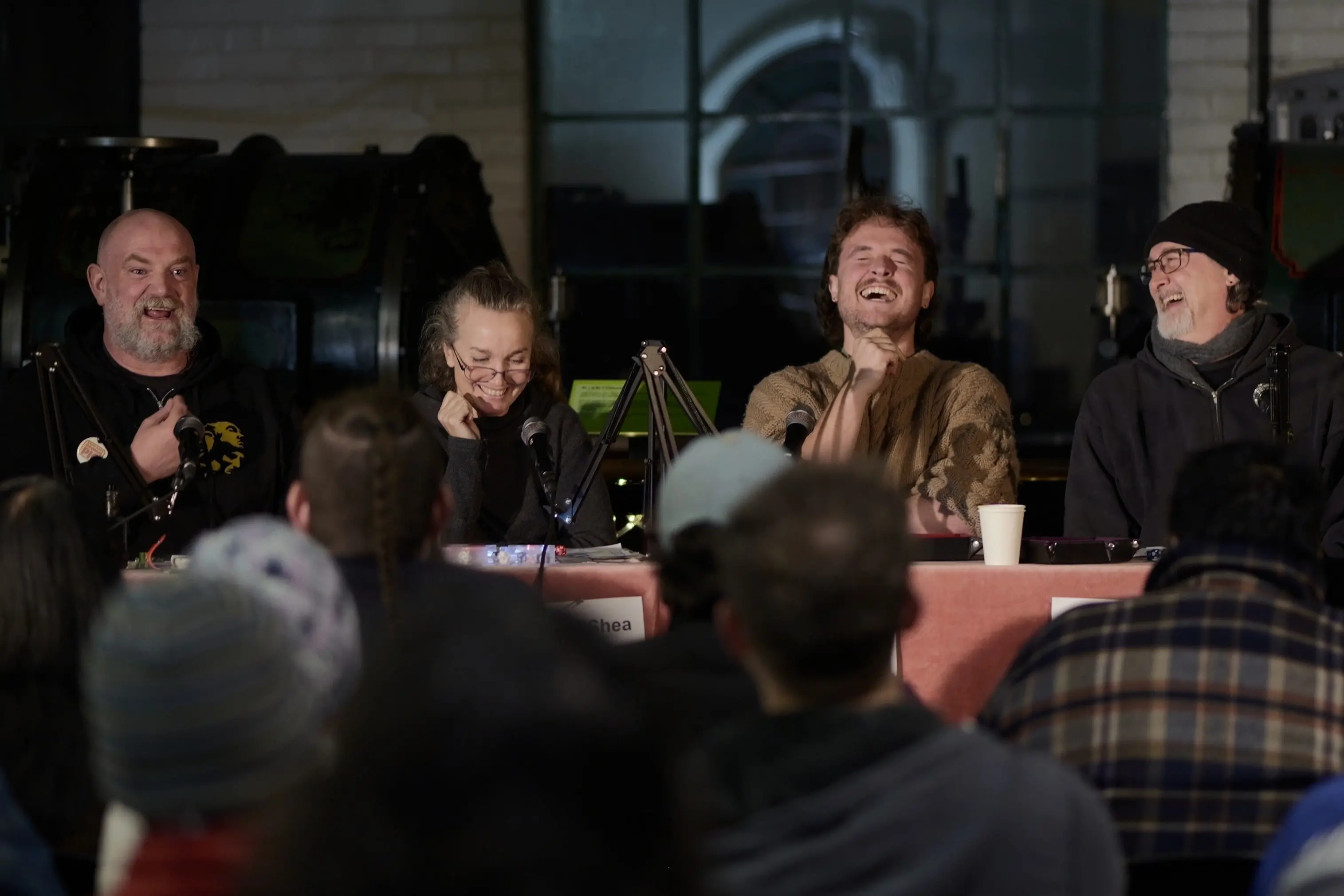 Players in a recent Downtime Activities Dungeons & Dragons event at Dunedin Gasworks Museum (from left) Mark Neilson, Rosella Hart, guest performer Nick Tipa and Matt Wilson enjoy a funny moment in the game, while audience members look on. Photo: Supplied