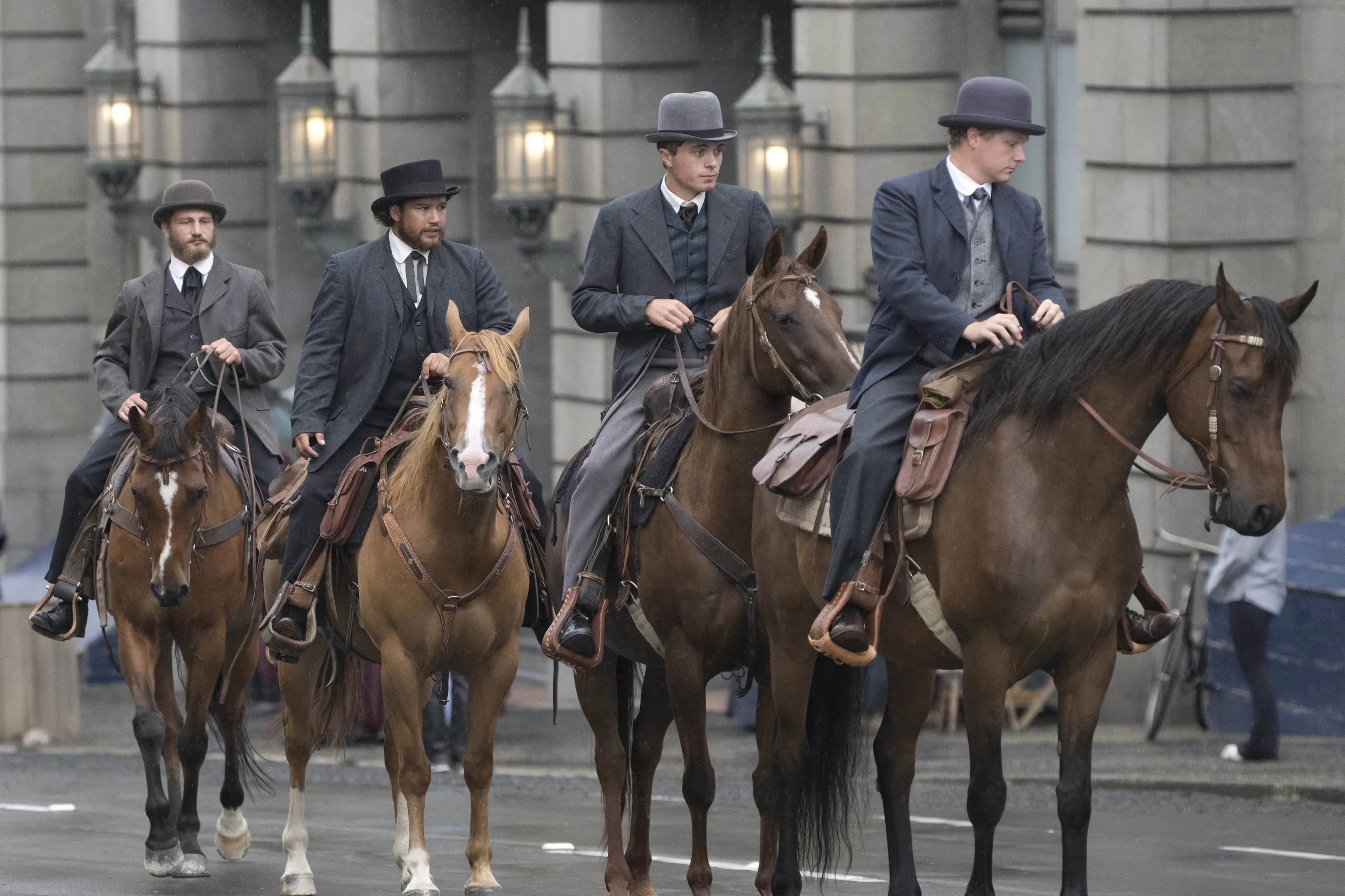 Horsemen dressed in period costume arrive in the Dunedin exchange for filming of the Netflix series East of Eden last year. Photo: Gerard O\\'Brien