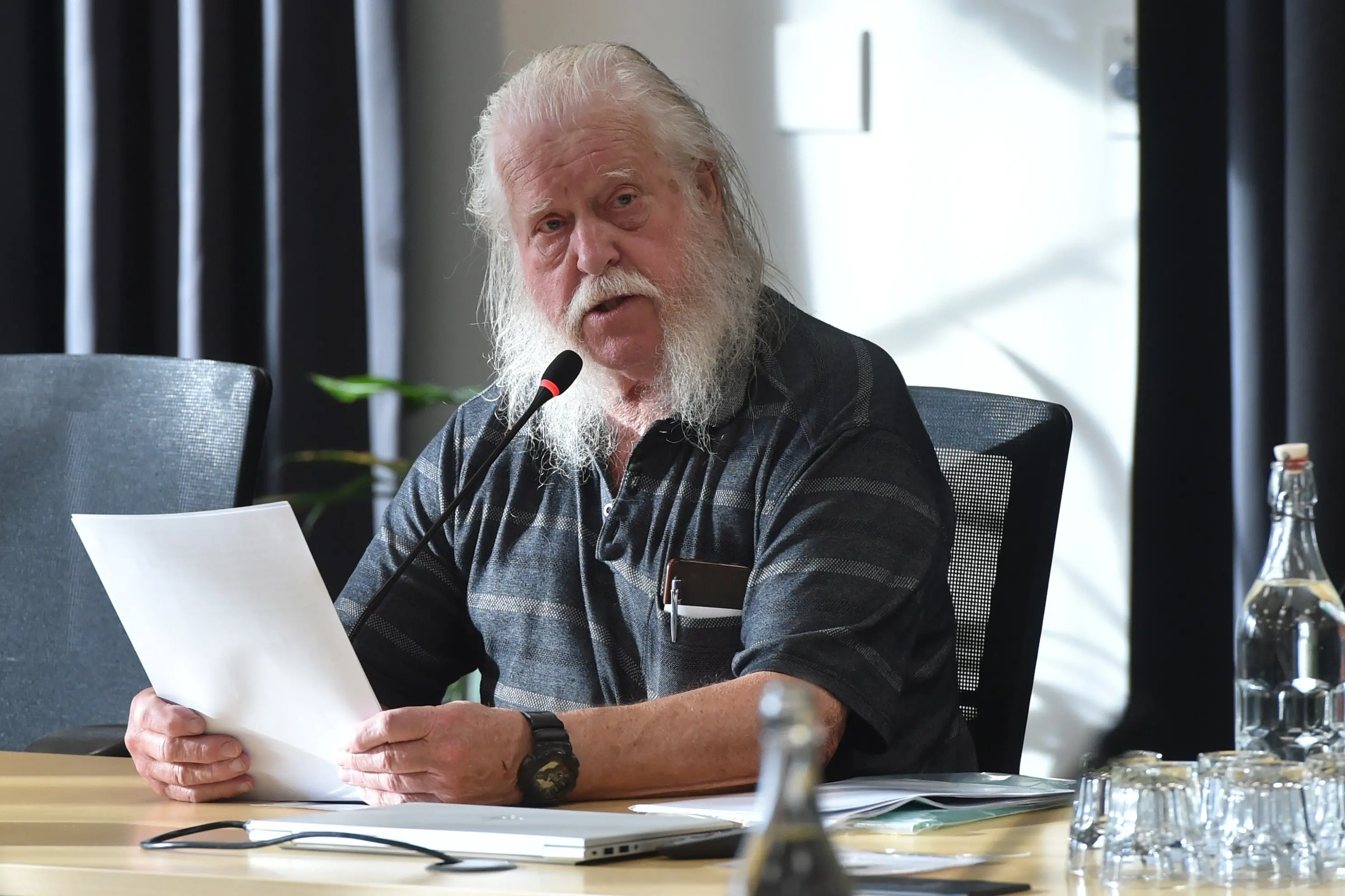 Tony Cummings of the Dunedin Area Citizens Association presents a petition to the Dunedin City Council yesterday. Photo: Gregor Richardson