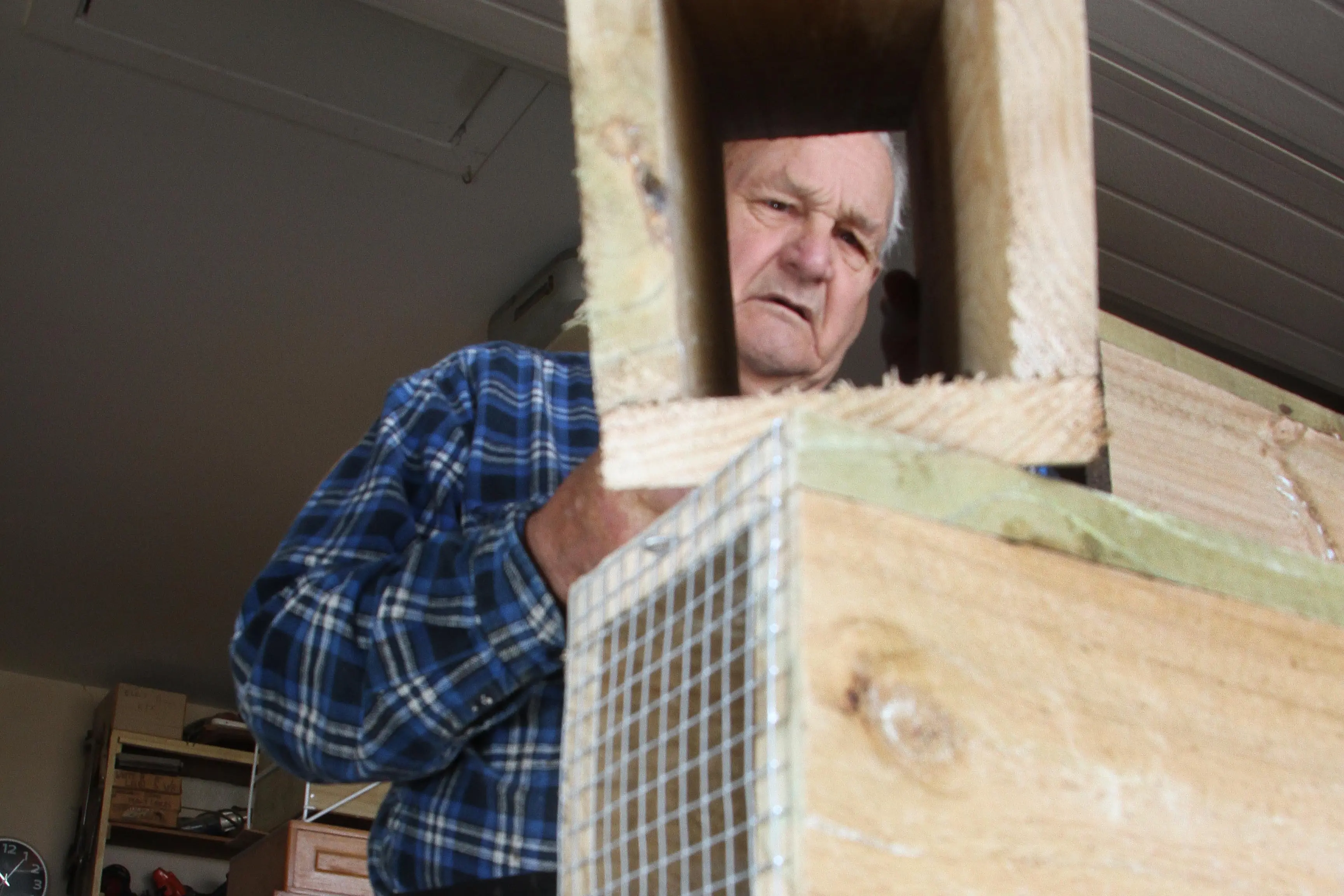 Arthur Linnell, a Rangiora retiree well-known for his wood working skills, is helping make traps for Pest Free Waimakariri. Photo: John Cosgrove