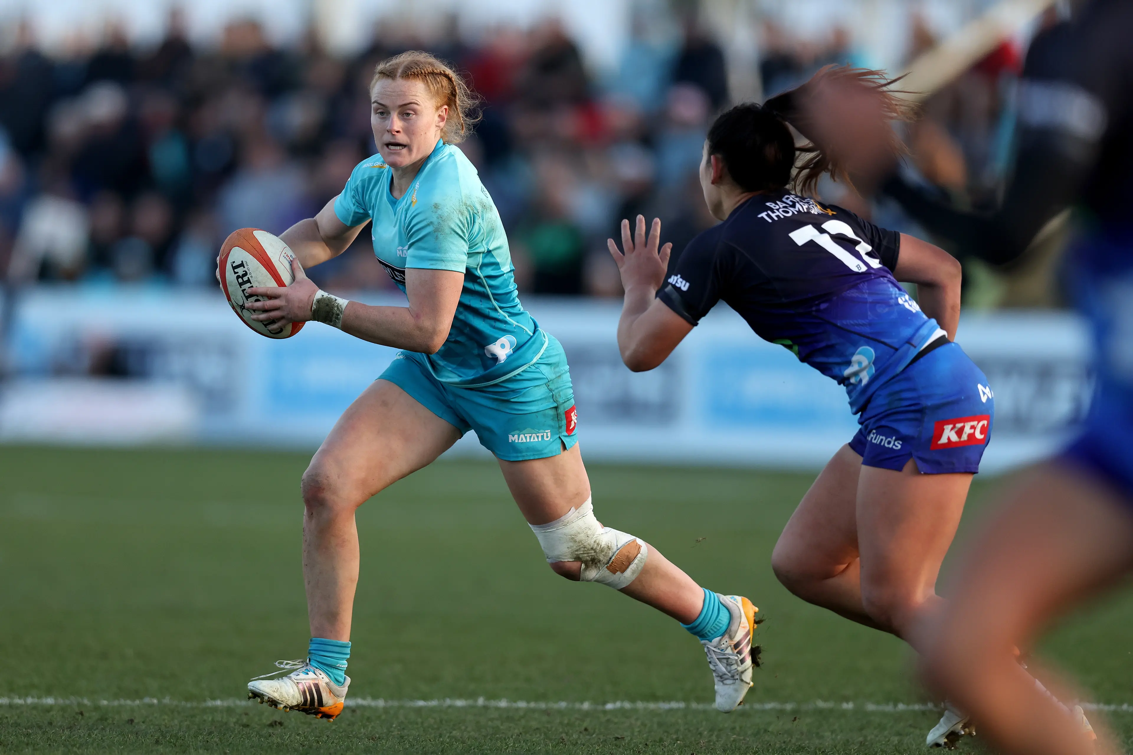 Matat\\u016B captain Grace Brooker sneaks past Blues defender Hollyrae Mete-Renata during their final round robin game last week. Photo: NZ Rugby/Smartframe