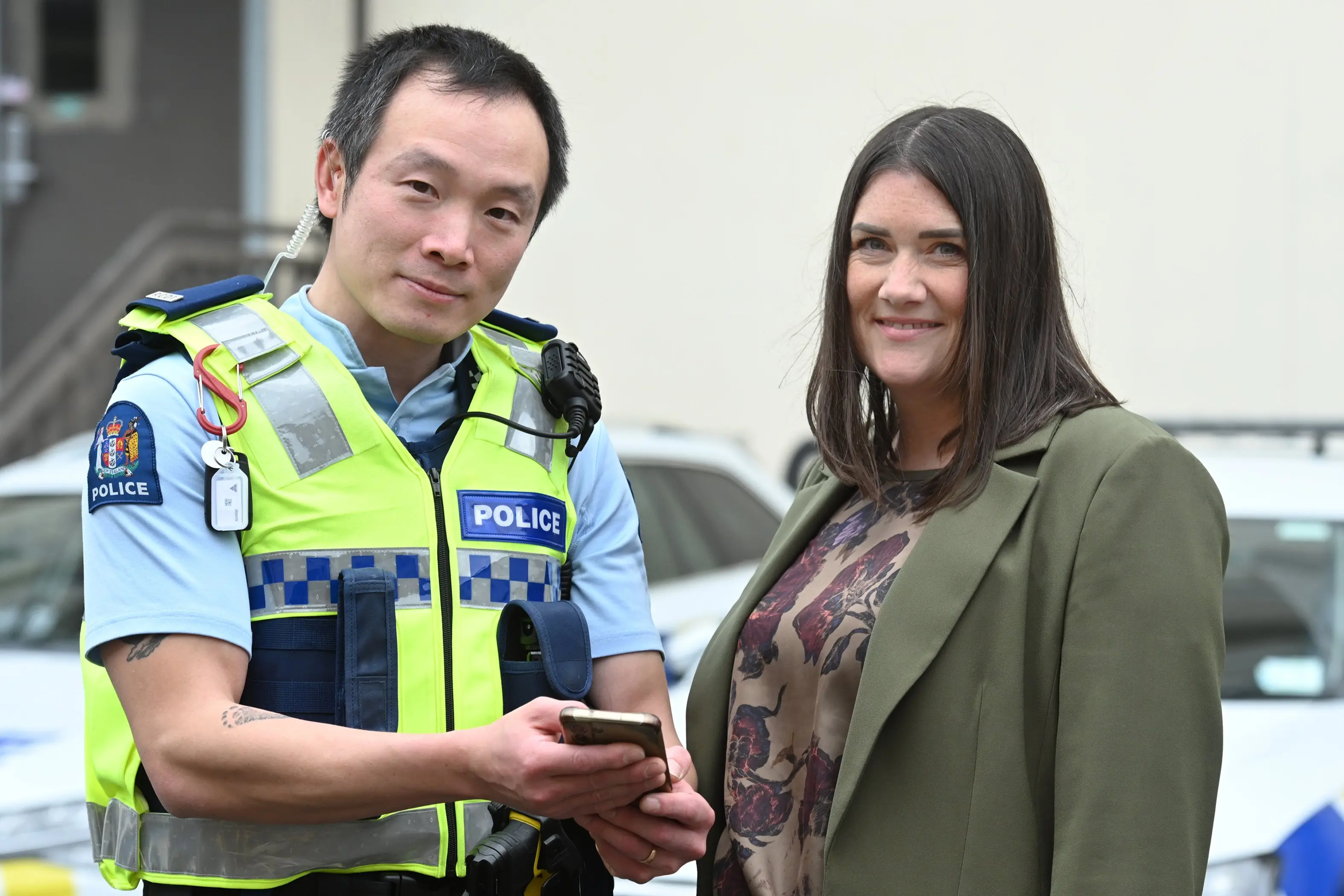 New Dunedin Constable  Ryan Huang with New Zealand Police wing 396 patron Chiquita Holden at the Dunedin central police station. Photo: Linda Robertson