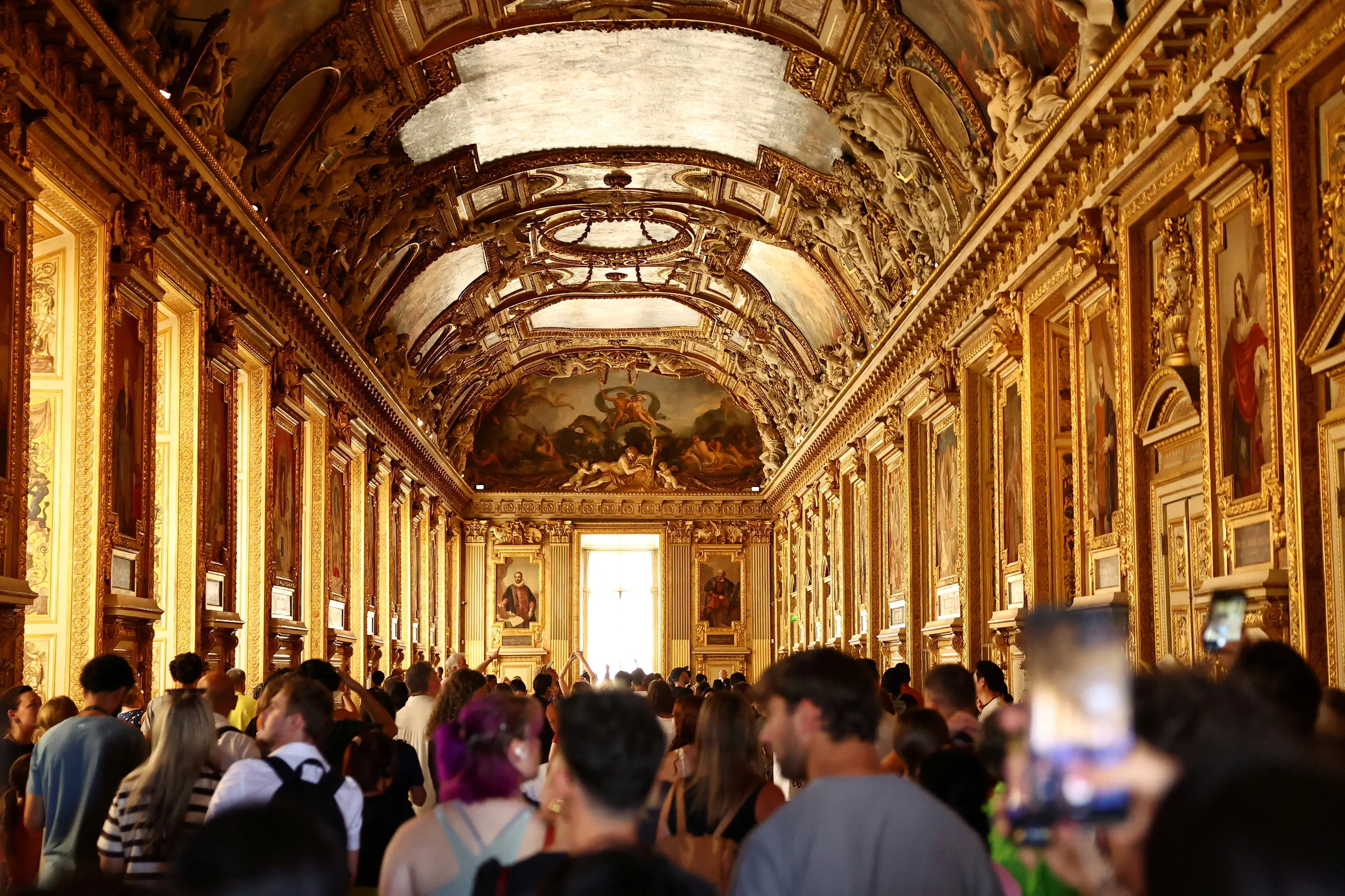 Visitors walk in the reopened Apollo Gallery on Wednesday. Photo: Reuters