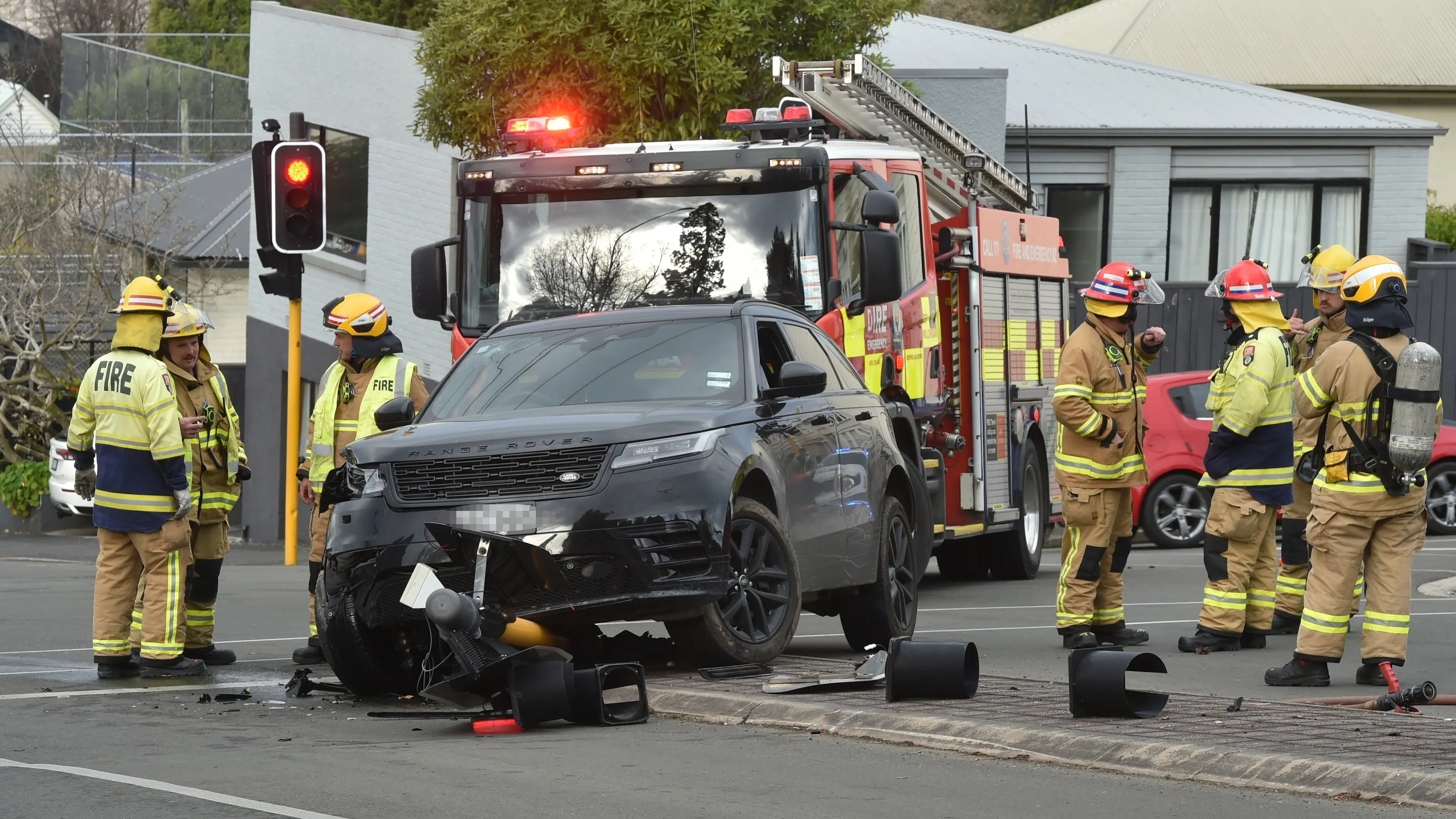 Pensioner bowled Dunedin traffic light while reaching into footwell