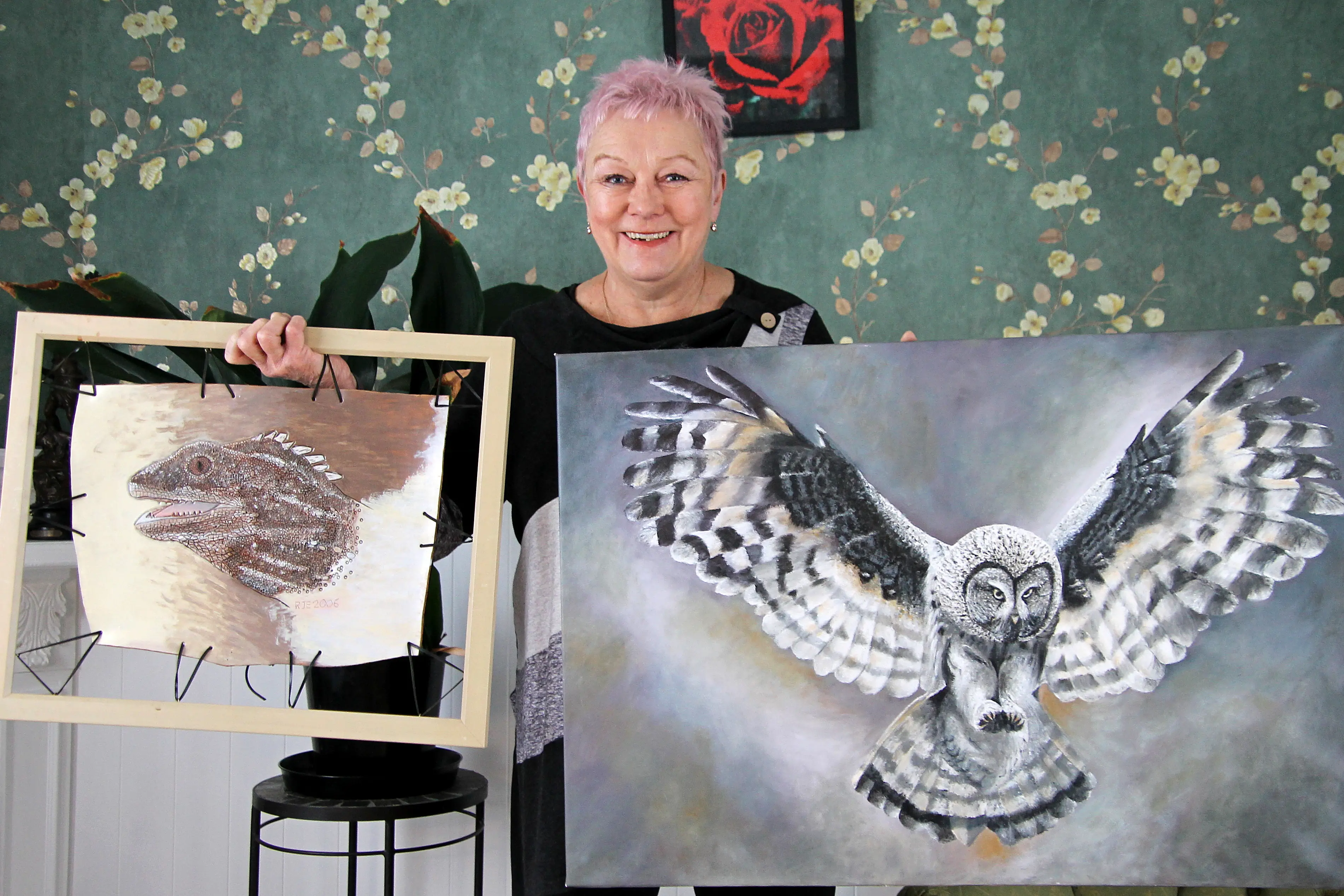 Art with Heart co-ordinator Maggie Tarver shows off samples of work to appear in the Milton art group\\u2019s upcoming exhibition. Photo: Nick Brook