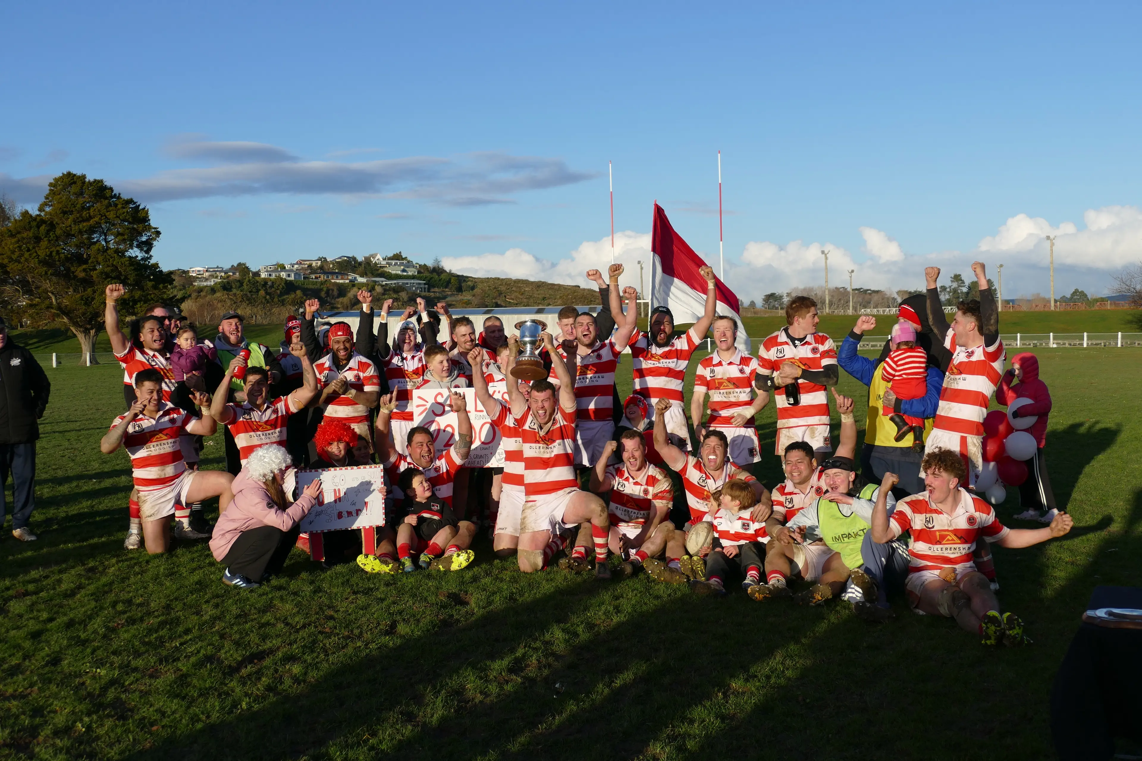 Clutha players celebrate their victory in the Southern Region premier club rugby final in Balclutha on Saturday. Photo: Richard Davison