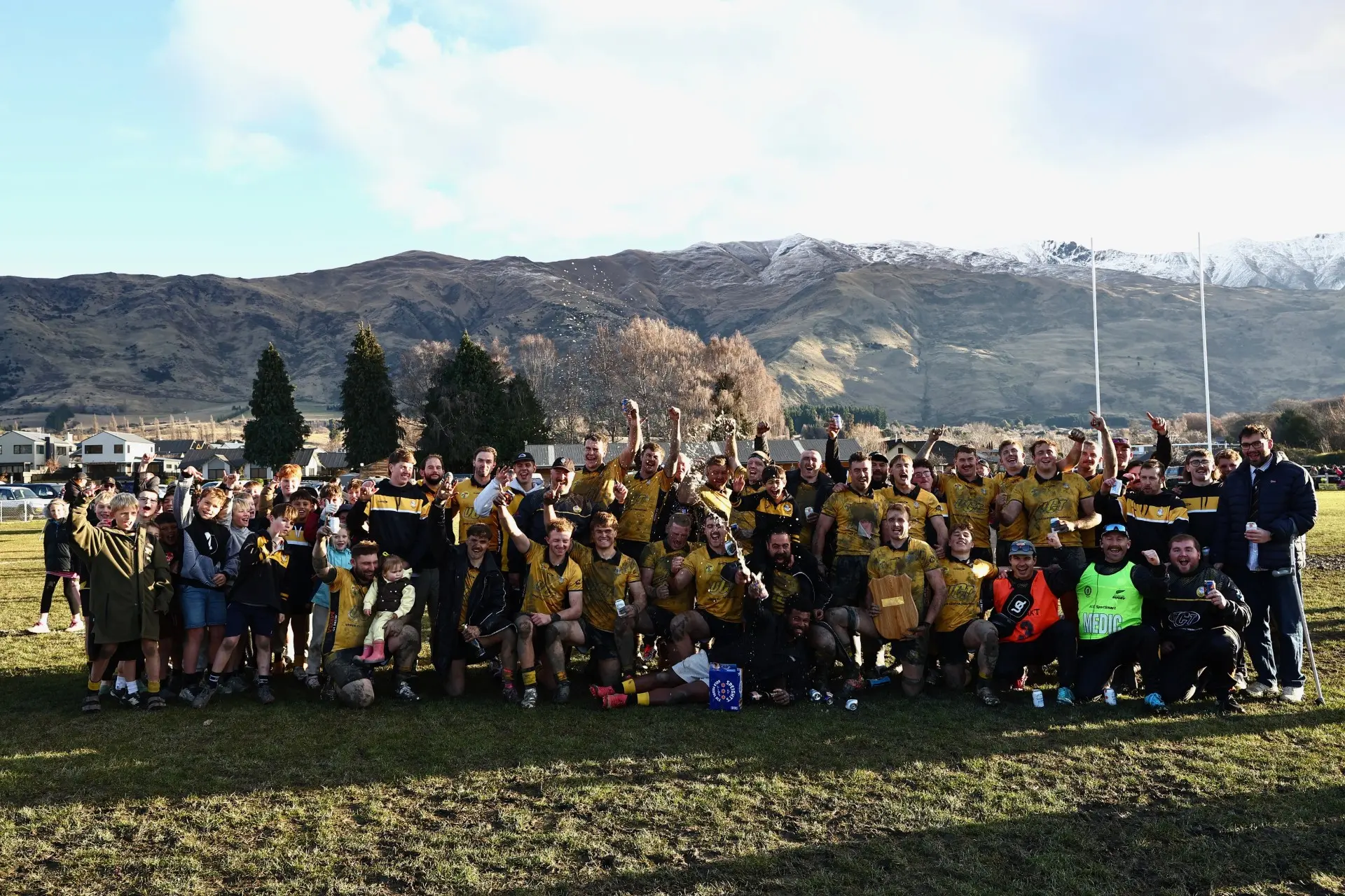 Upper Clutha players and supporters celebrate victory in the Central Otago premier club rugby final in W\\u0101naka on Saturday. Photo: James Allan Photography