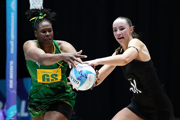 Silver Fern Kelly Jackson (right) competes for the ball against Jamaica\\'s Romelda Aiken. Photo: Getty Images