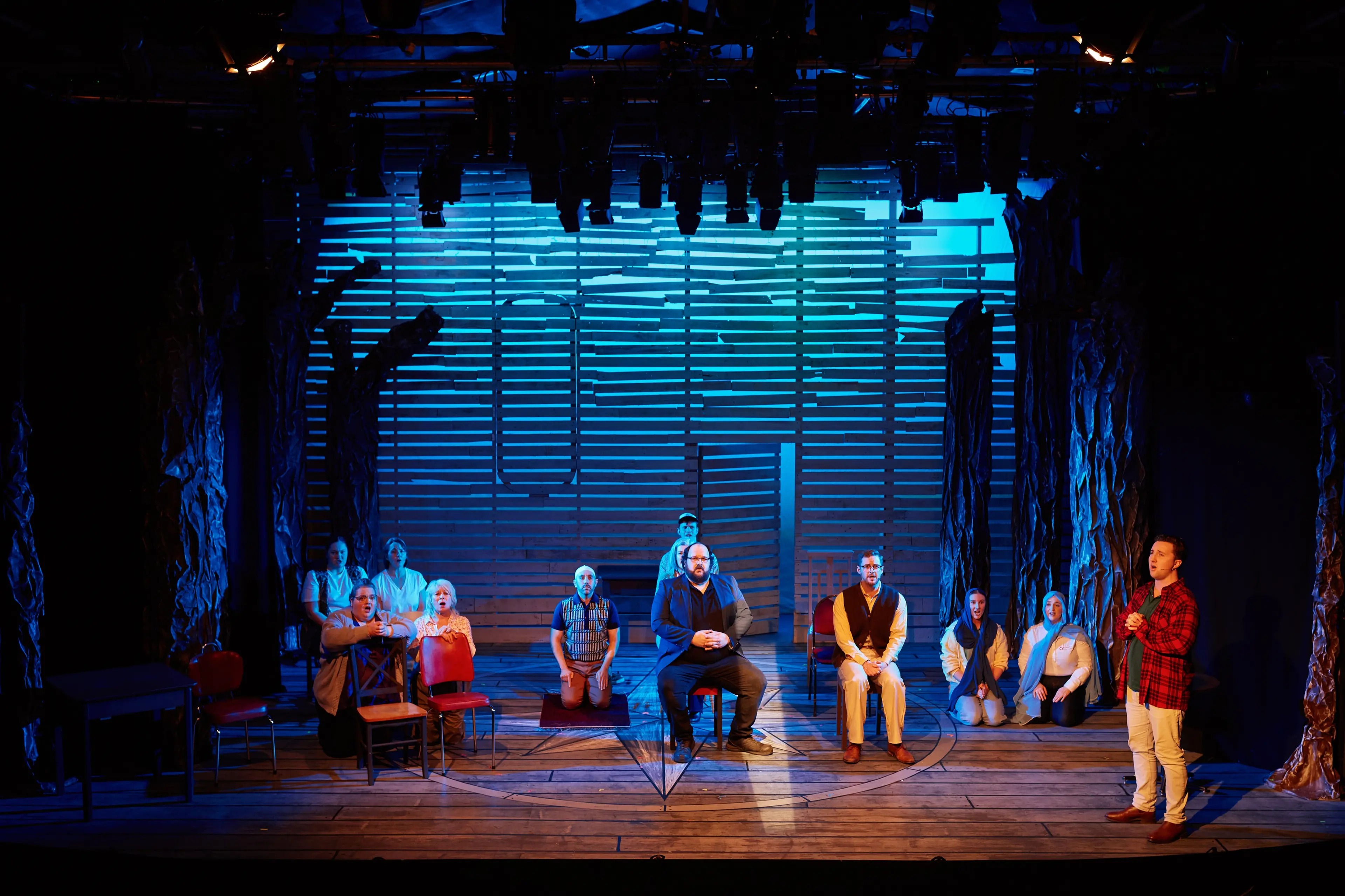 Luke Robb as Kevin T leads the cast in a beautiful rendition of \"Prayer\". Photo: Brad Reeve