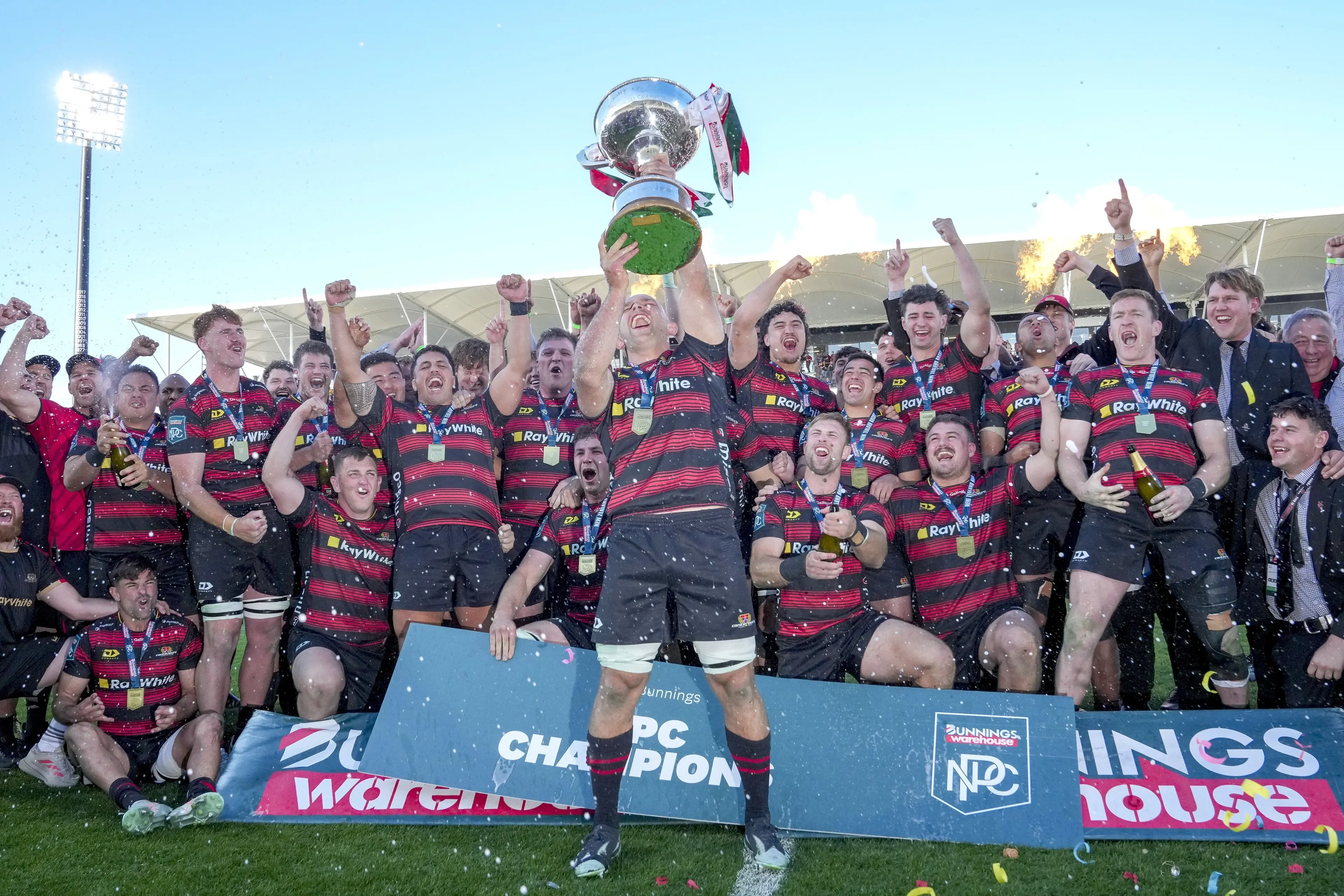 Canterbury captain Tom Christie lifts the NPC trophy after his side beat Otago 36-28 in the final in Christchurch last year. Photo: Michael Thomas
