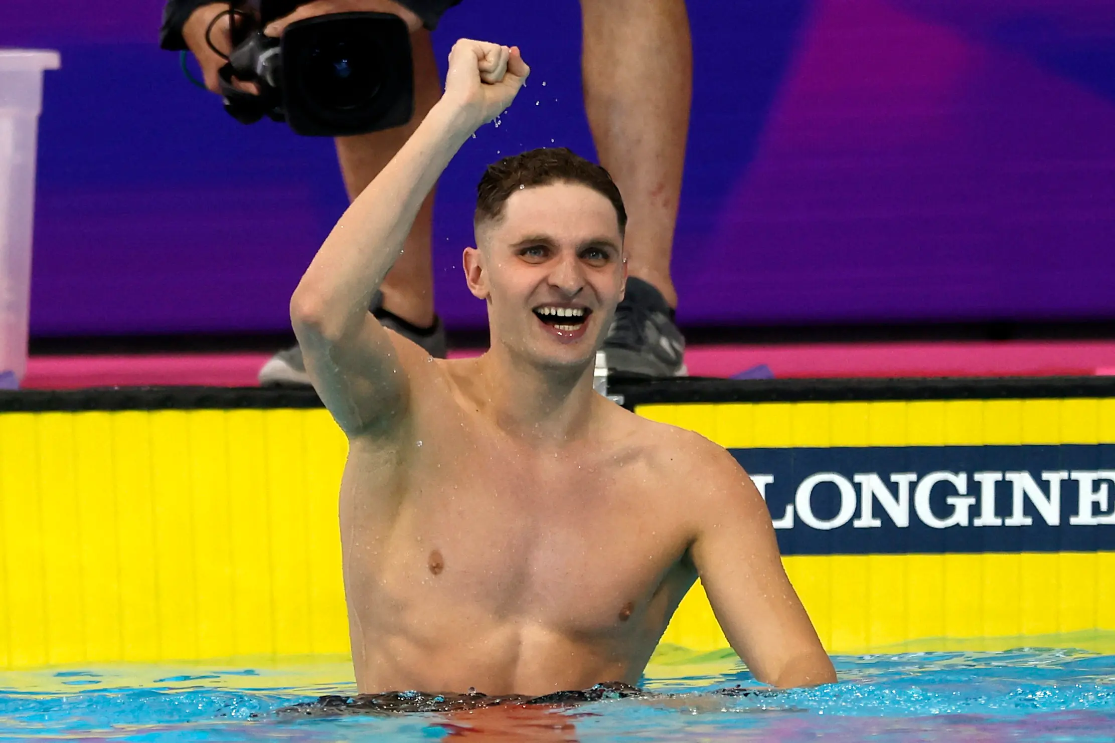 Lewis Clareburt celebrates after winning the men\\'s 200m butterfly final. Photo: Reuters