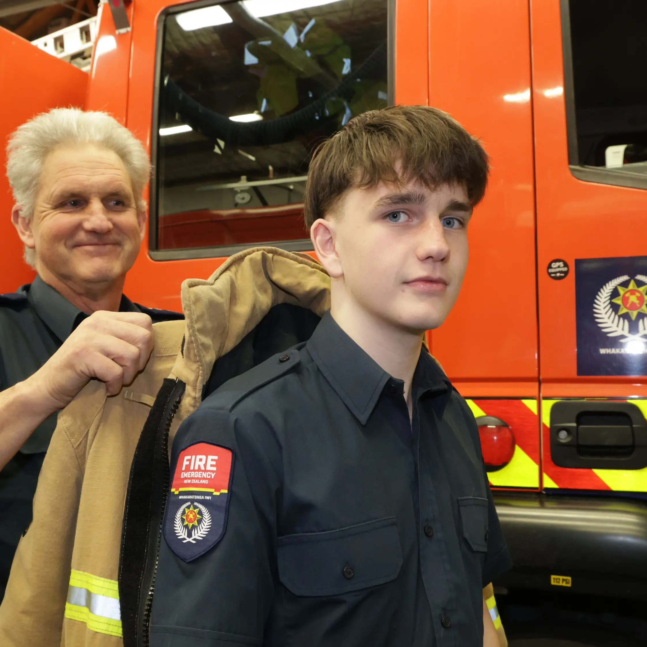 Firefighter proud to stand beside his son