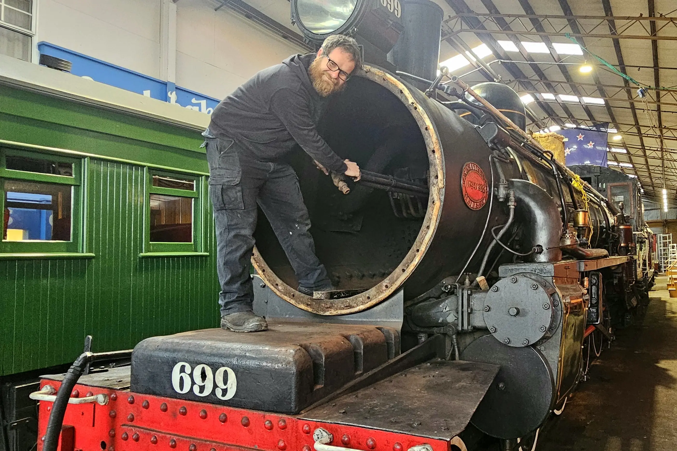 Pleasant Point Museum and Railway president Daniel Smith shows off the\\u00A0boiler tubes in the Ab 699 steam locomotive. Photo: Connor Haley