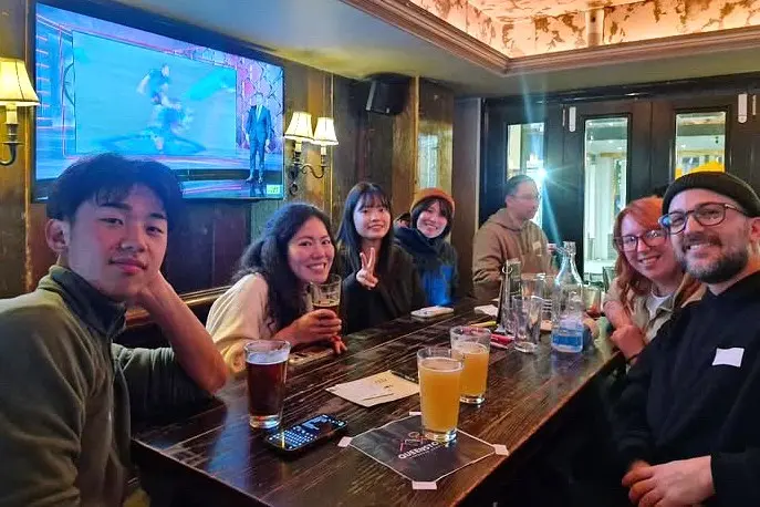 Global gathering: Attendees chat at a recent Queenstown Language Exchange meet-up.