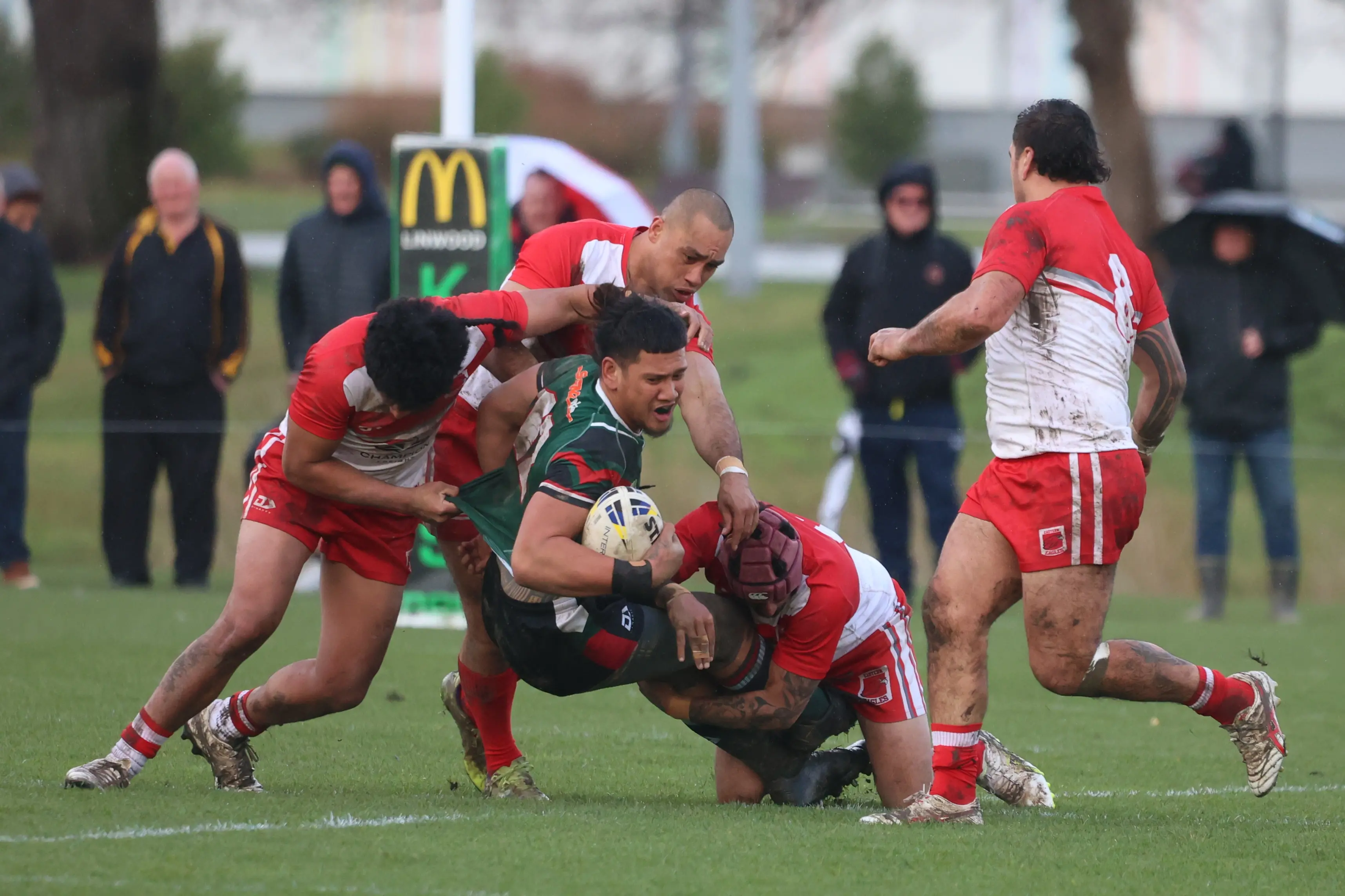 Linwood Keas\\' Graeme Patu-Vaega\\'au is stopped by three Eastern Eagles defenders in Eastern\\'s 32-22 victory on Saturday. PHOTO: ABRAHAM ATHERTON PHOTOGRAPHY