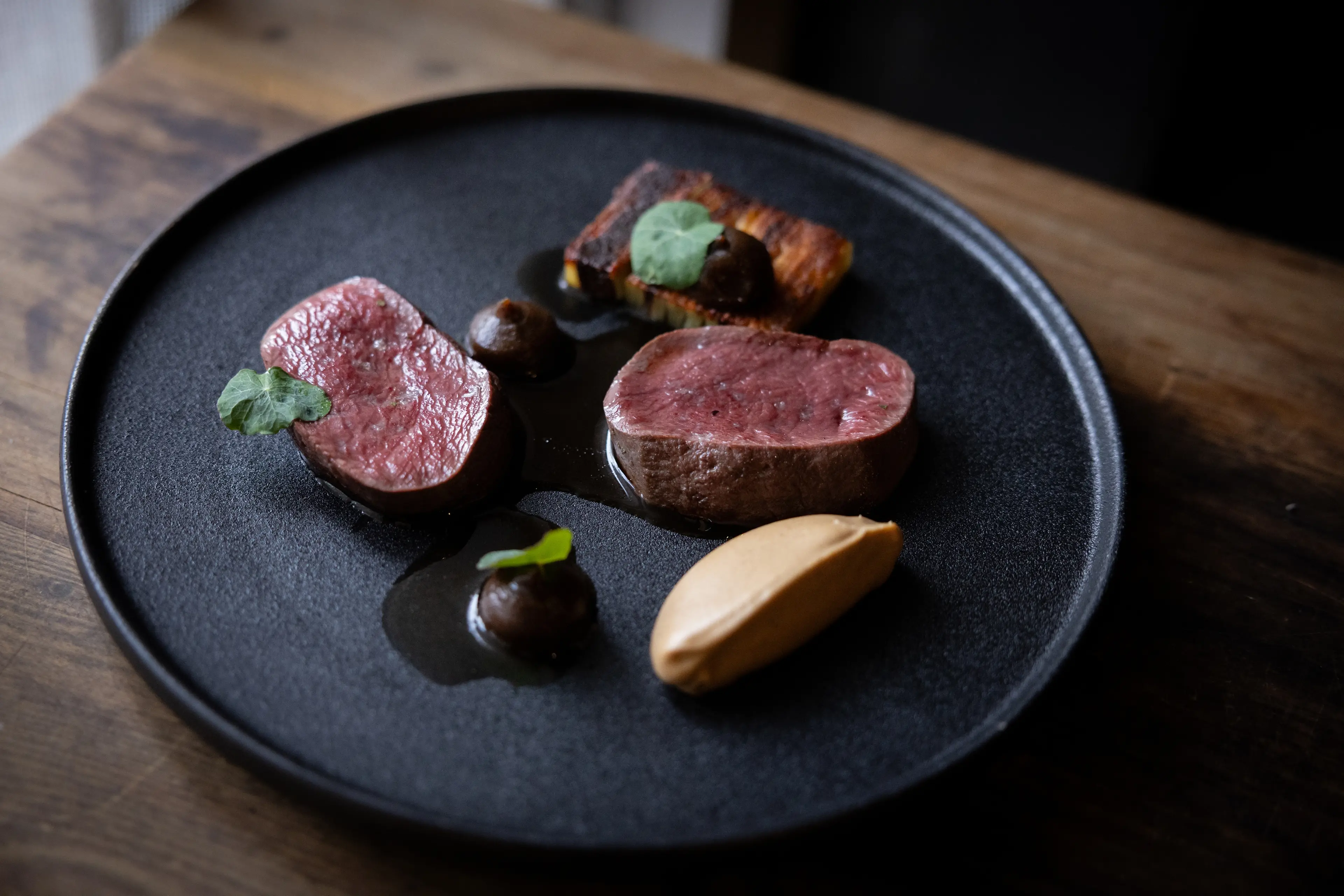 R\\u0101t\\u0101\\'s Southland venison, braised shank boulangere, celeriac and burnt apple. Photo: Daz Coulten photography.