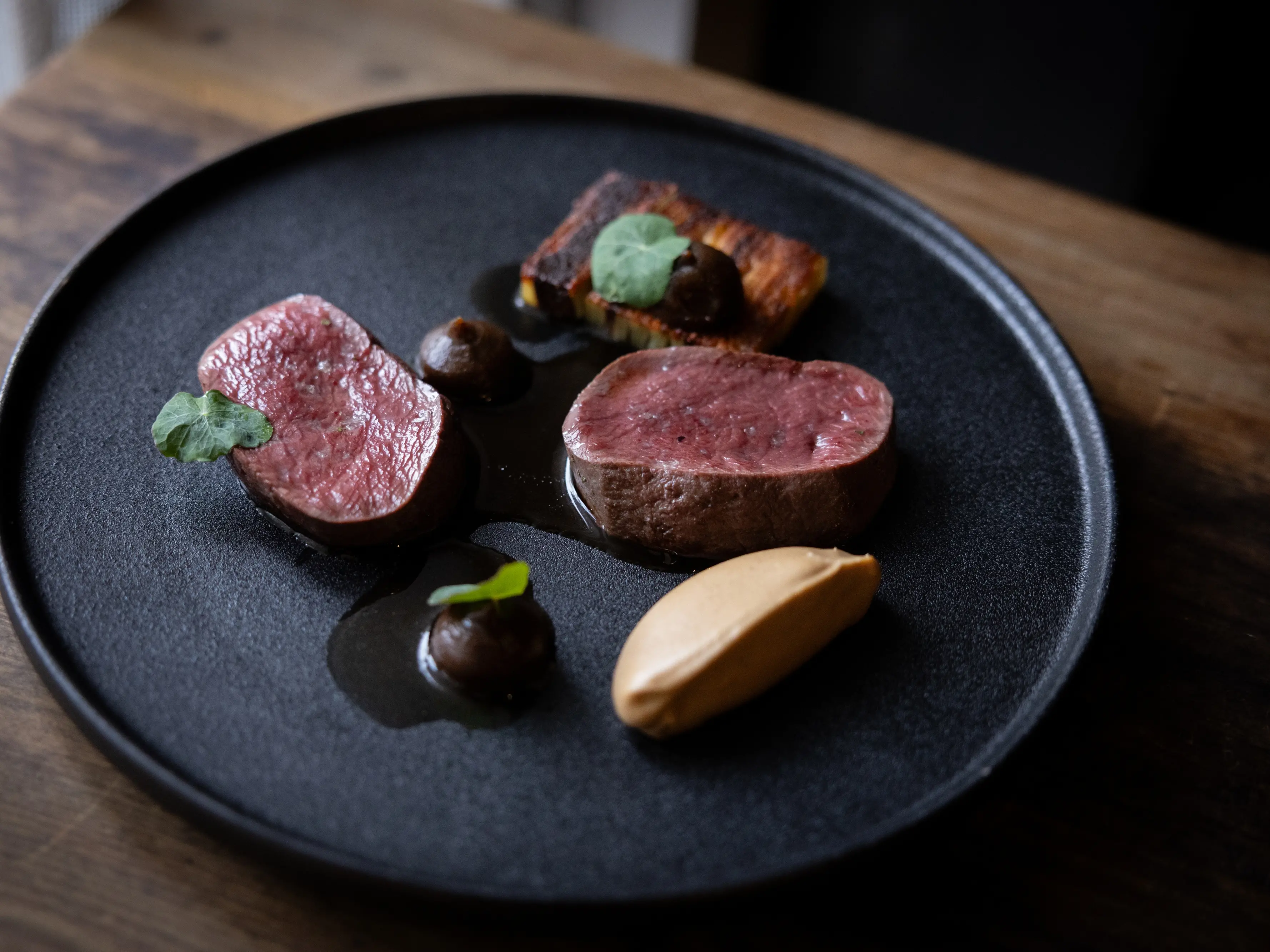 R\\u0101t\\u0101\\'s Southland venison, braised shank boulangere, celeriac and burnt apple. Photo: Daz Coulten photography.