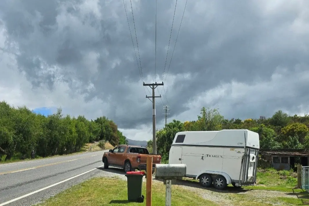 Heather Morris drives her vehicle and trailer out of her driveway on to State Highway 8, just east of the Ettrick township. PHOTO: SUPPLIED