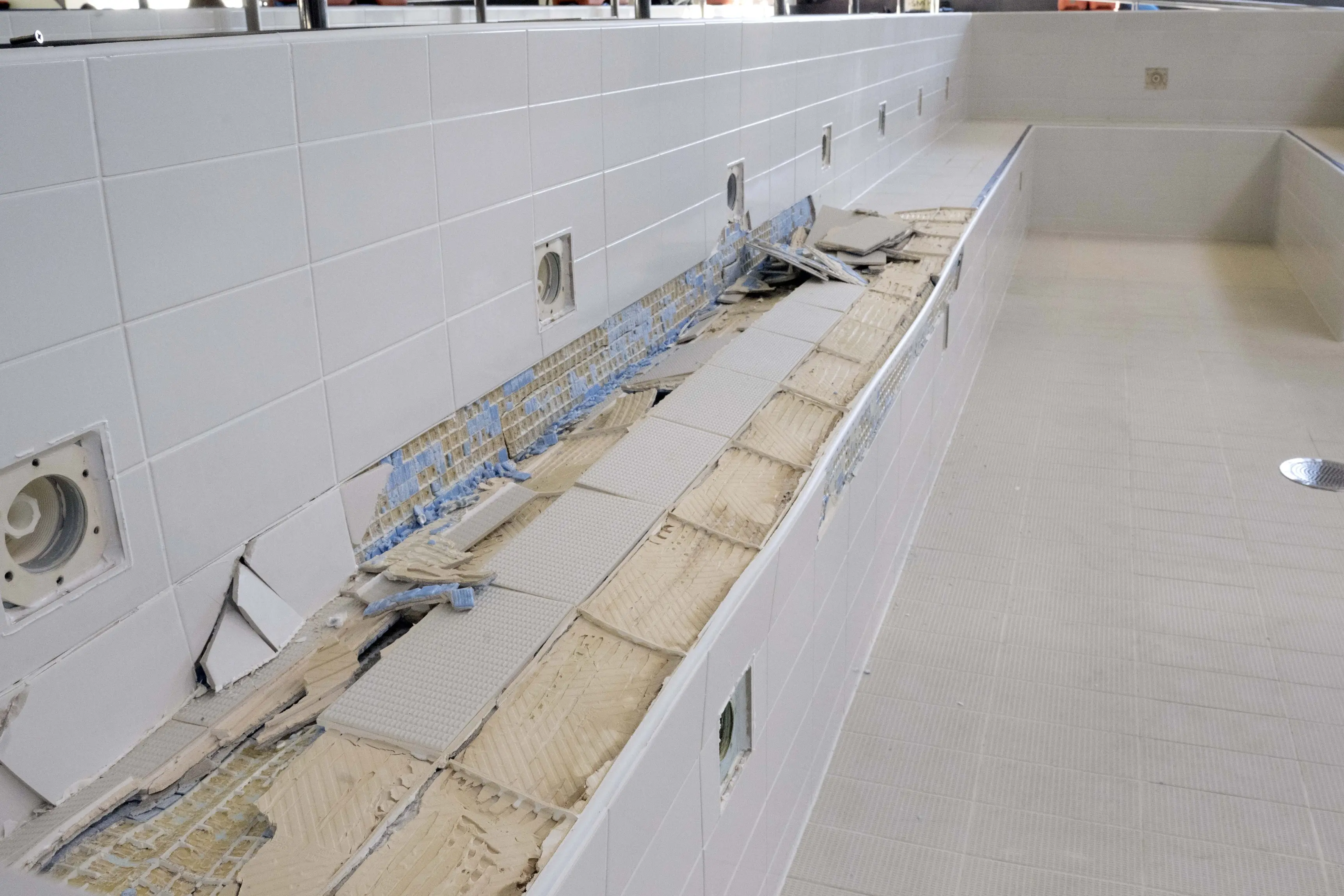 Tiles being removed from the spa pool at Mosgiel\\'s Te Puna o Whakaehu in June after a significant failure. Photo: Gerard O\\'Brien