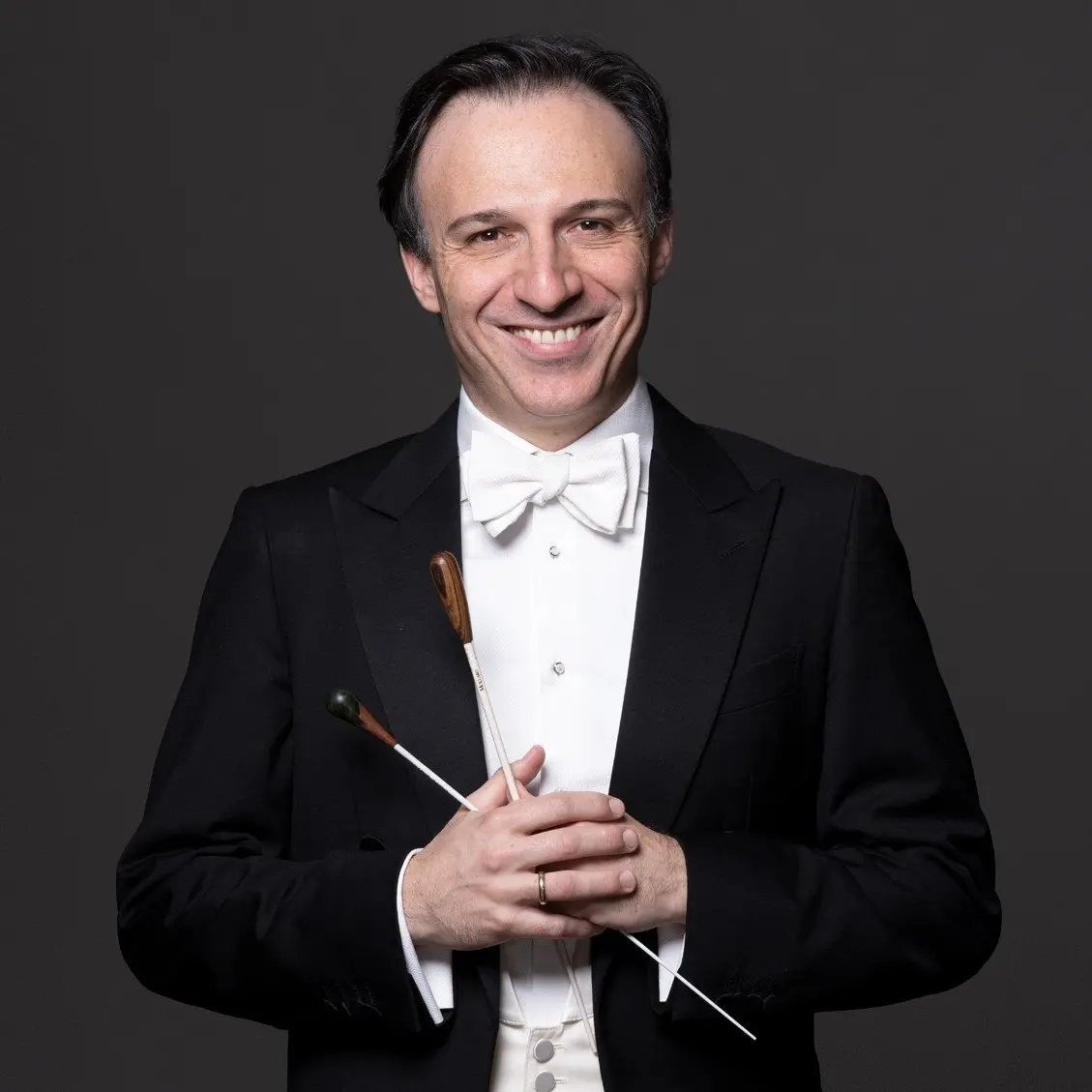 Clerici returns to conduct joyful works in celebration concert