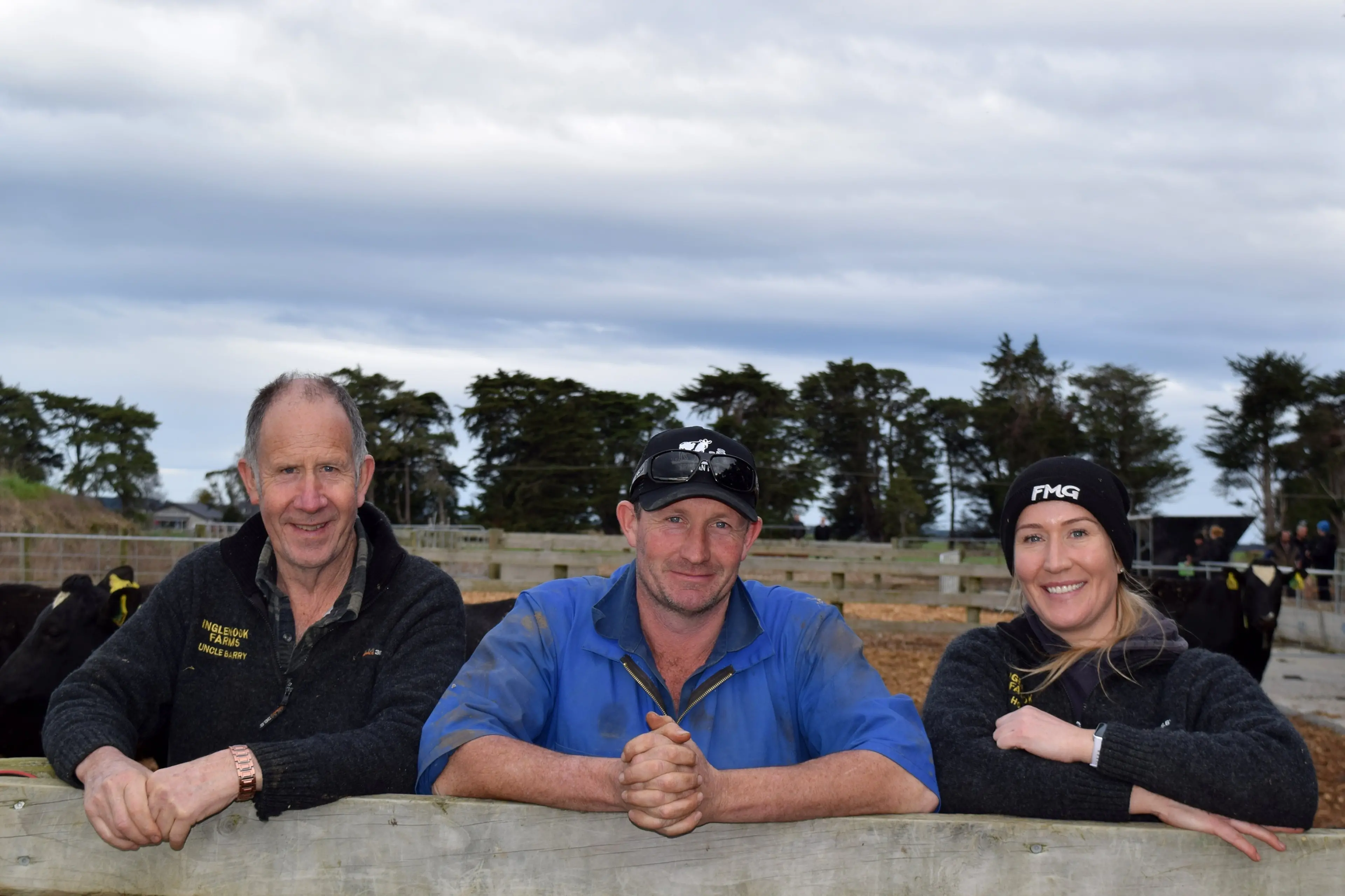 In a bark chip calving pad on Inglenook Farms in Mokotua are (from left) owner Barry Warnock, sharemilker Tim Warnock and young stock manager Donna Warnock. Photo: Shawn McAvinue