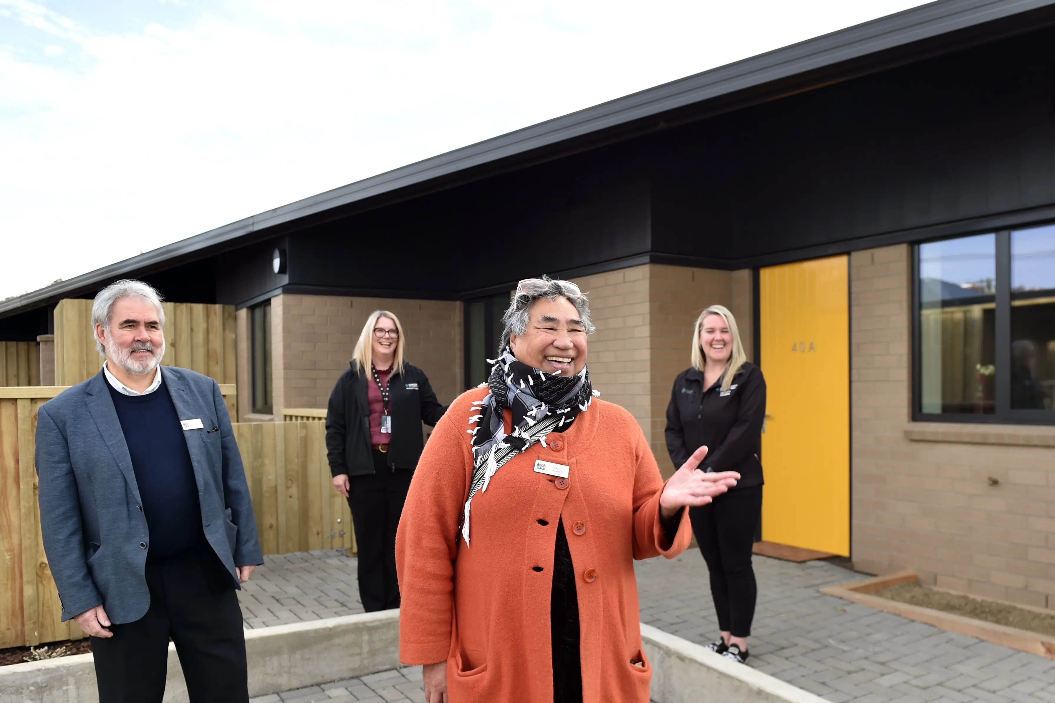 Pleased with the completion of new community housing units in Fitzroy St, Dunedin, are (from left) Cr John Chambers, Dunedin City Council community housing manager Kate Milton, Cr Marie Laufiso and tenancy manager Natalie Savigny. Photo: Peter McIntosh