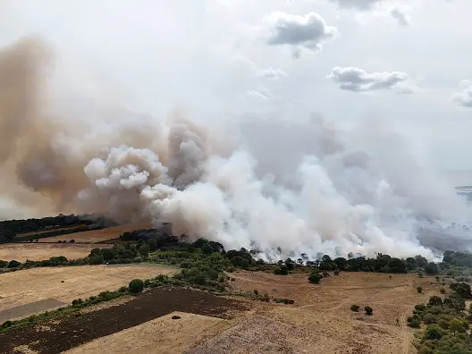 Evacuations as wildfire rages in eastern England
