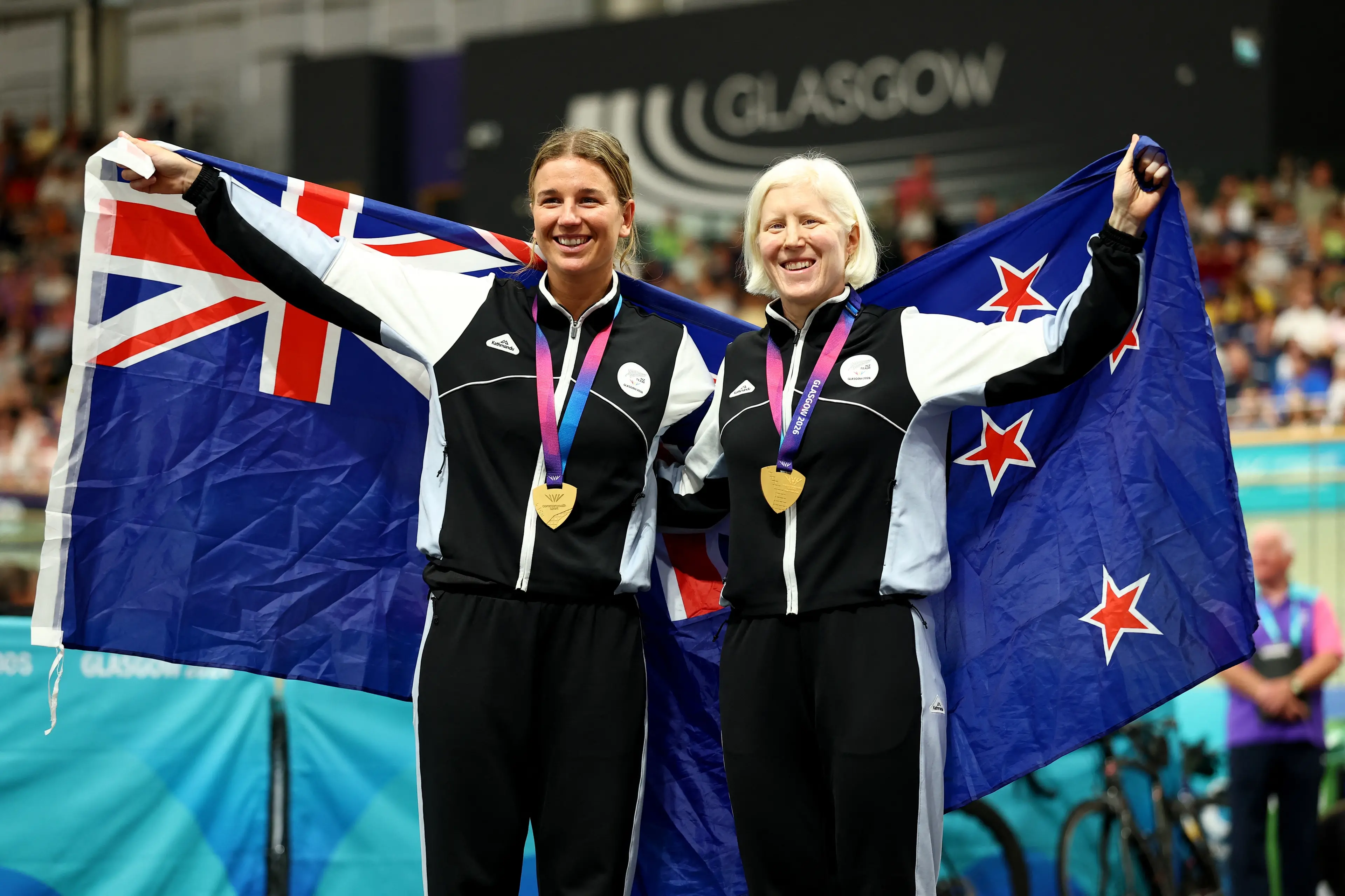 Gold medallists Jessie Hodges (left) and Emma Foy celebrate on the podium. Photo: Reuters