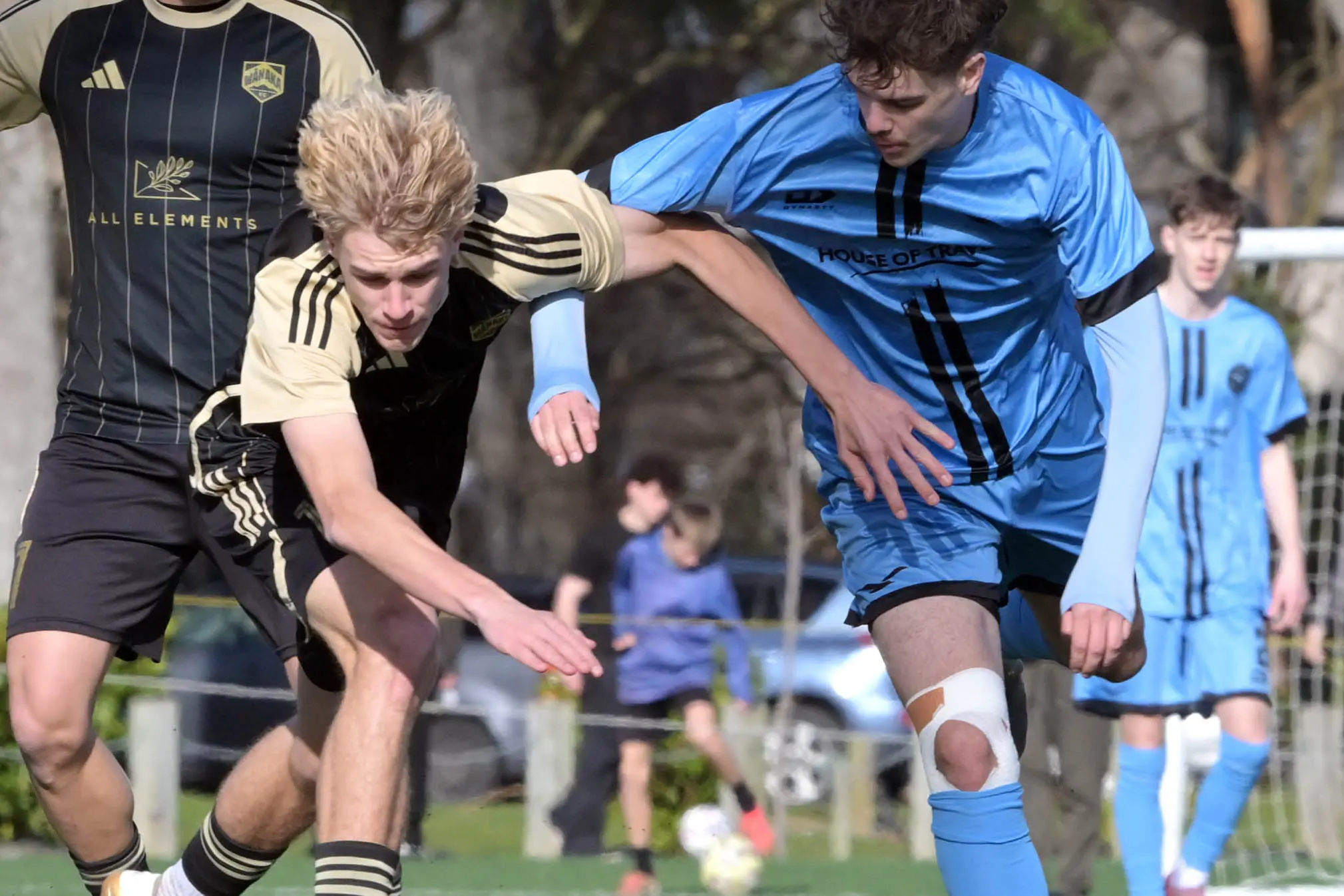 Zack Adams-Biggs (W\\u0101naka, left) and Cato Williams (Dunedin City Royals) contest the ball during their Southern League game at Logan Park on Saturday. Photo: Gerard O\\'Brien