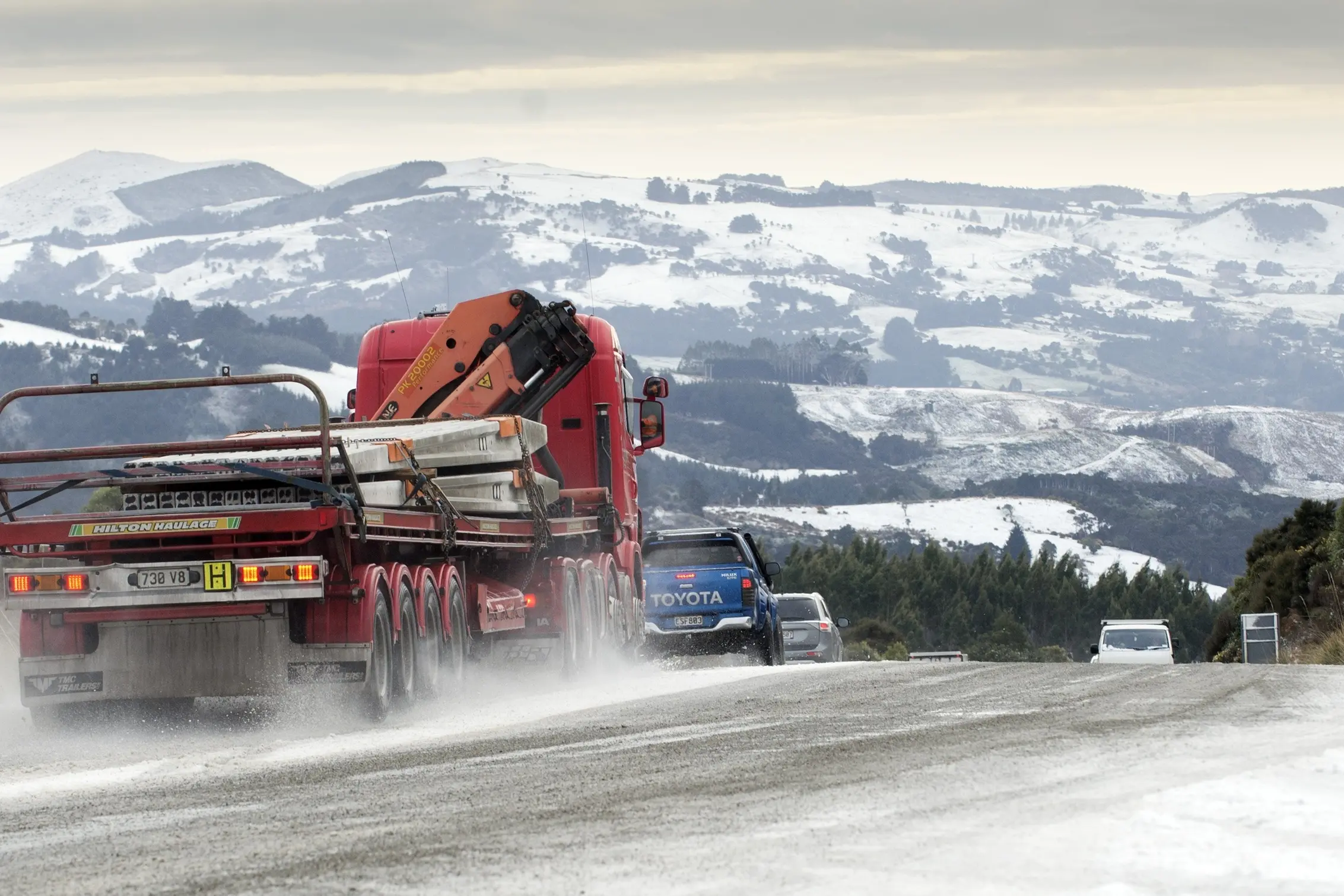 Vehicles drive in icy conditions on the Dunedin to Waitati Highway. Photo: Gerard O\\'Brien