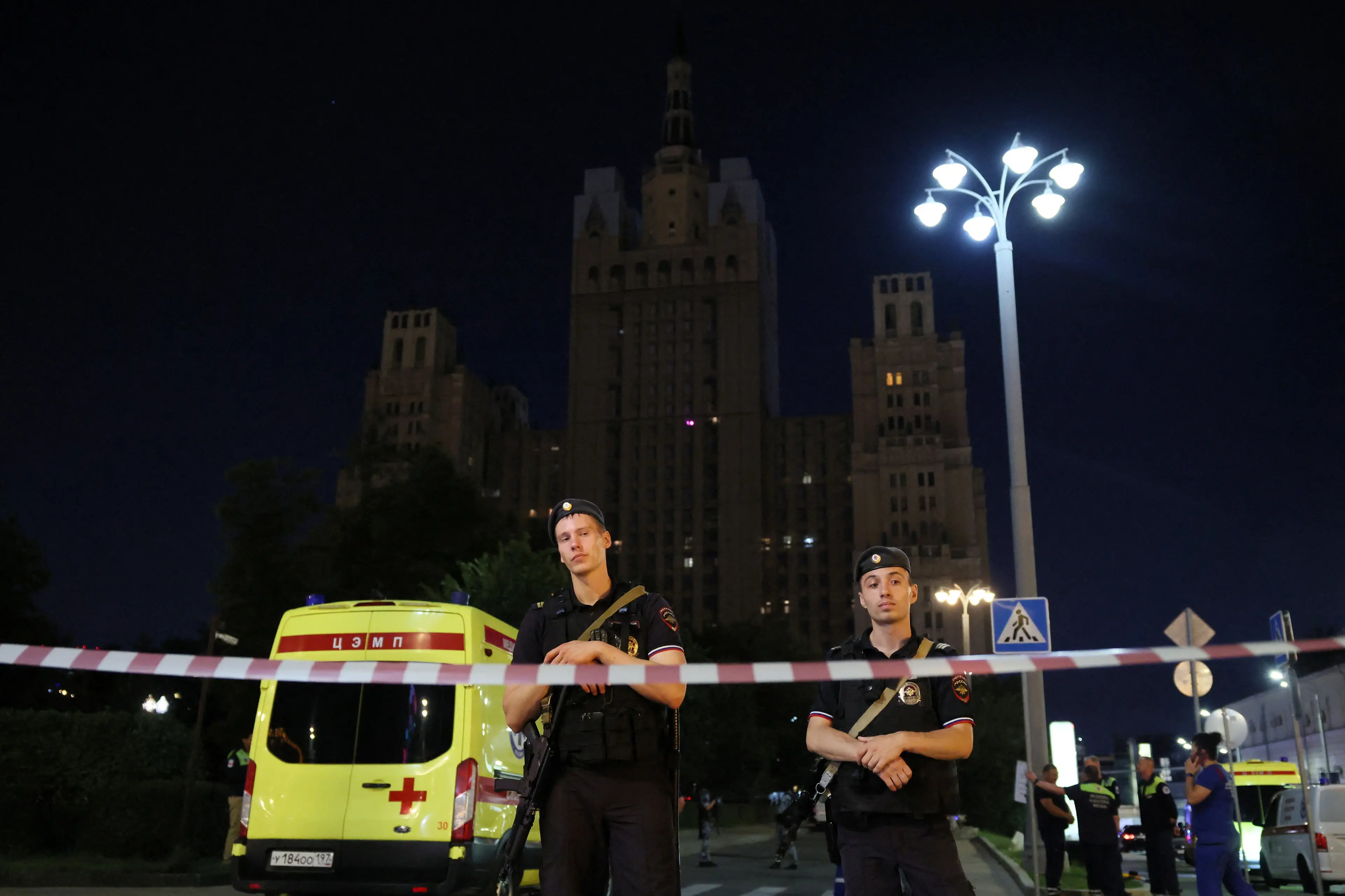 Police stand guard at the site of the explosion in central Moscow. Photo: Reuters