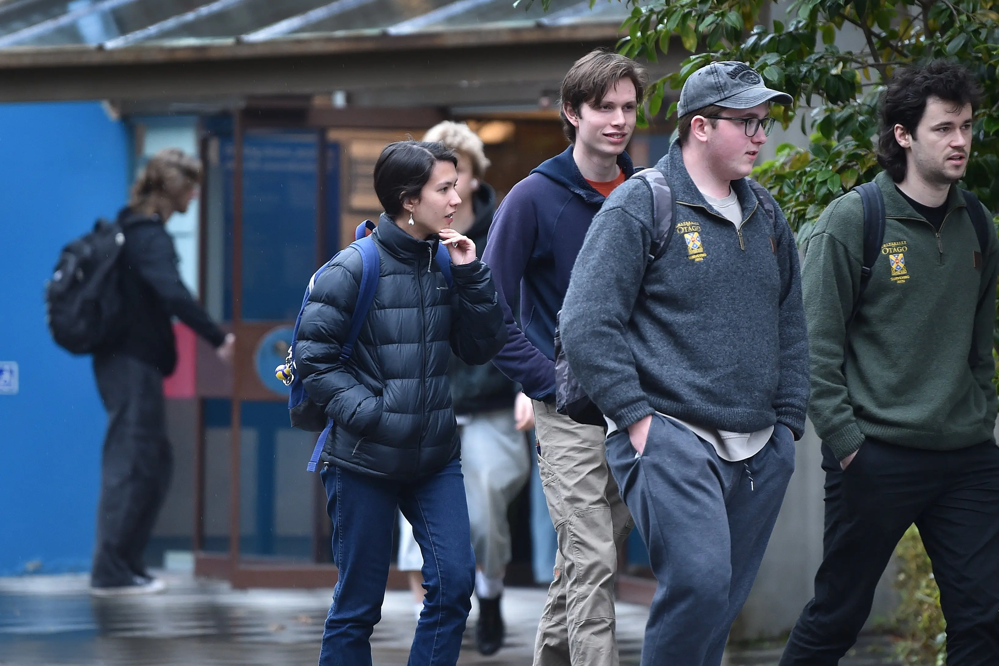 Otago University second-year surveying students (from left) Shanti Collins, Thomas Thurlow, Matthew McKenzie and Tim Mathers walk out of a lecture at the Archway Building on Monday. Photo: Peter McIntosh