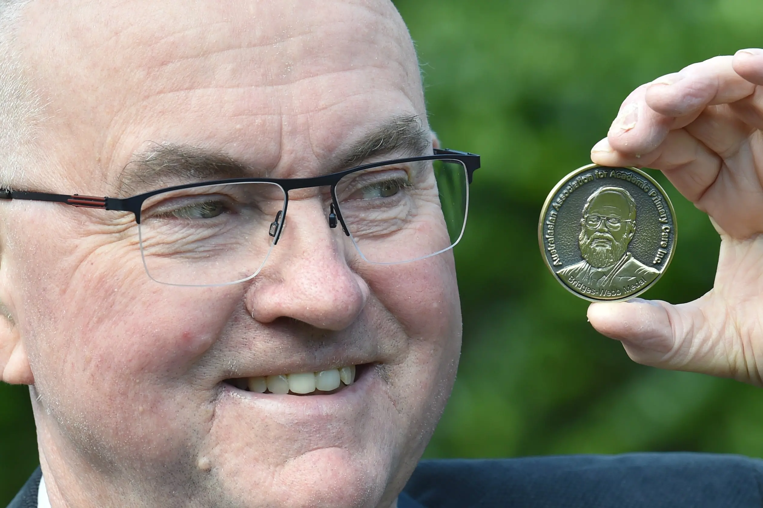 University of Otago Elaine Gurr chair of general practice and part-time Dunedin general practitioner Prof Tim Stokes with\\u00A0the Australasian Association for Academic Primary Care Charles Bridges-Webb Medal. Photo: Peter McIntosh