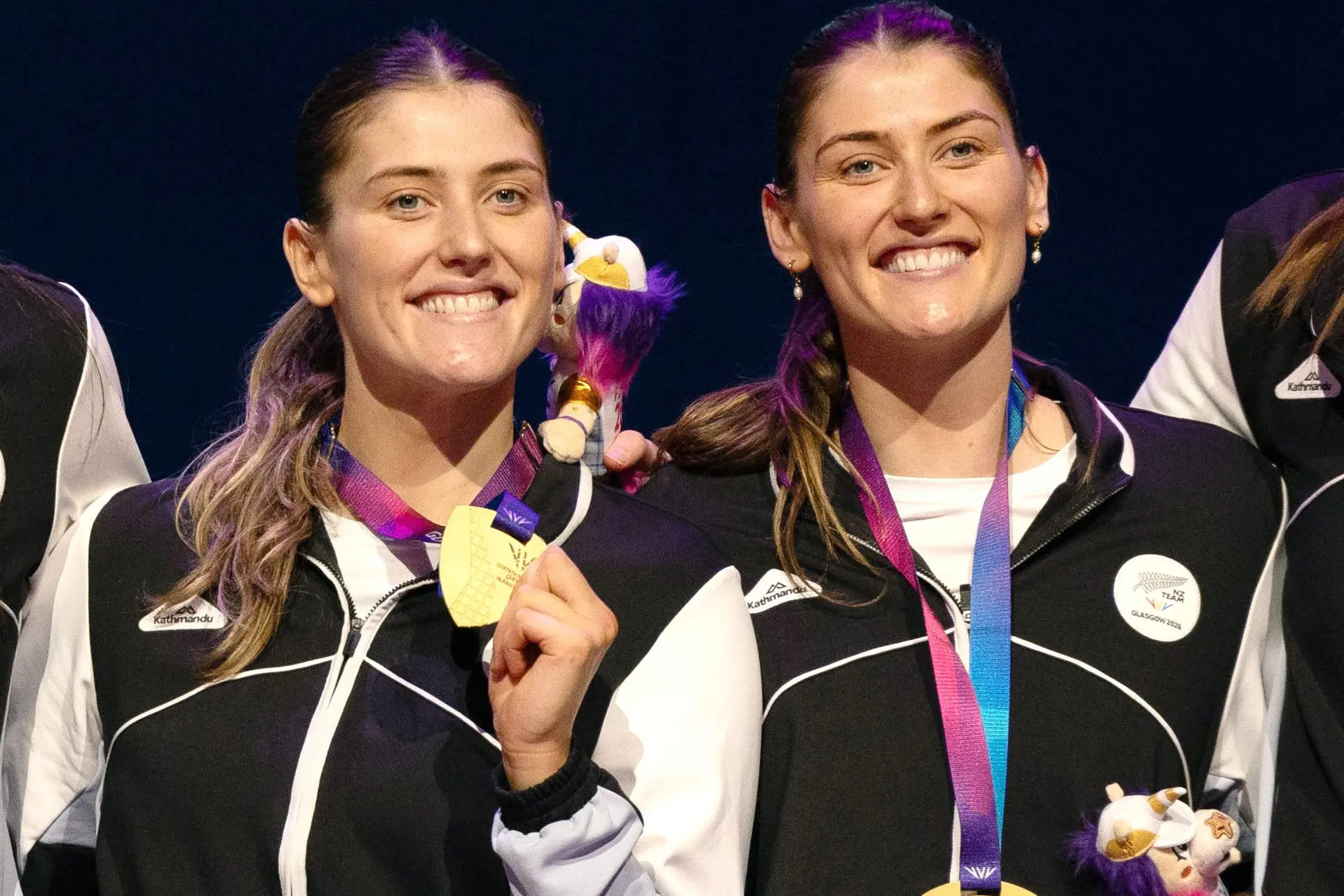 Silver Fern sisters Kate (left) and Georgia Heffernan celebrate their Commonwealth Games gold medals after helping the Silver Ferns beat Jamaica 56-48 in the final in Glasgow on Monday. Photo: Getty Images