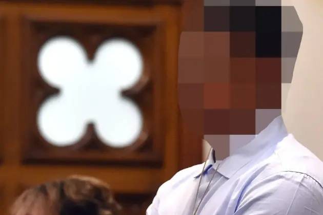 The teenager in the High Court at Dunedin during his trial. Photo: Peter McIntosh