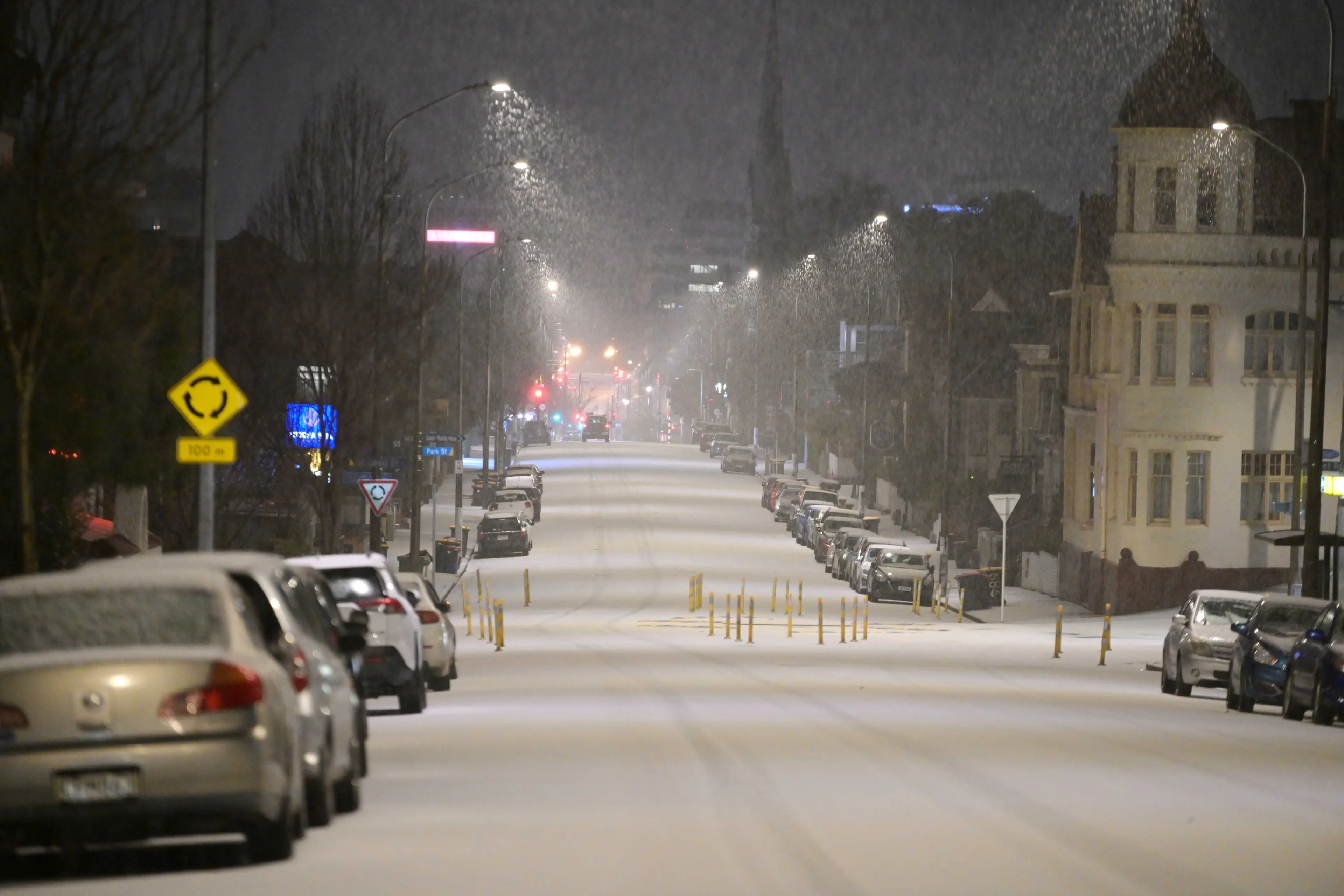 Highway closed and schools open late as snow hits Dunedin