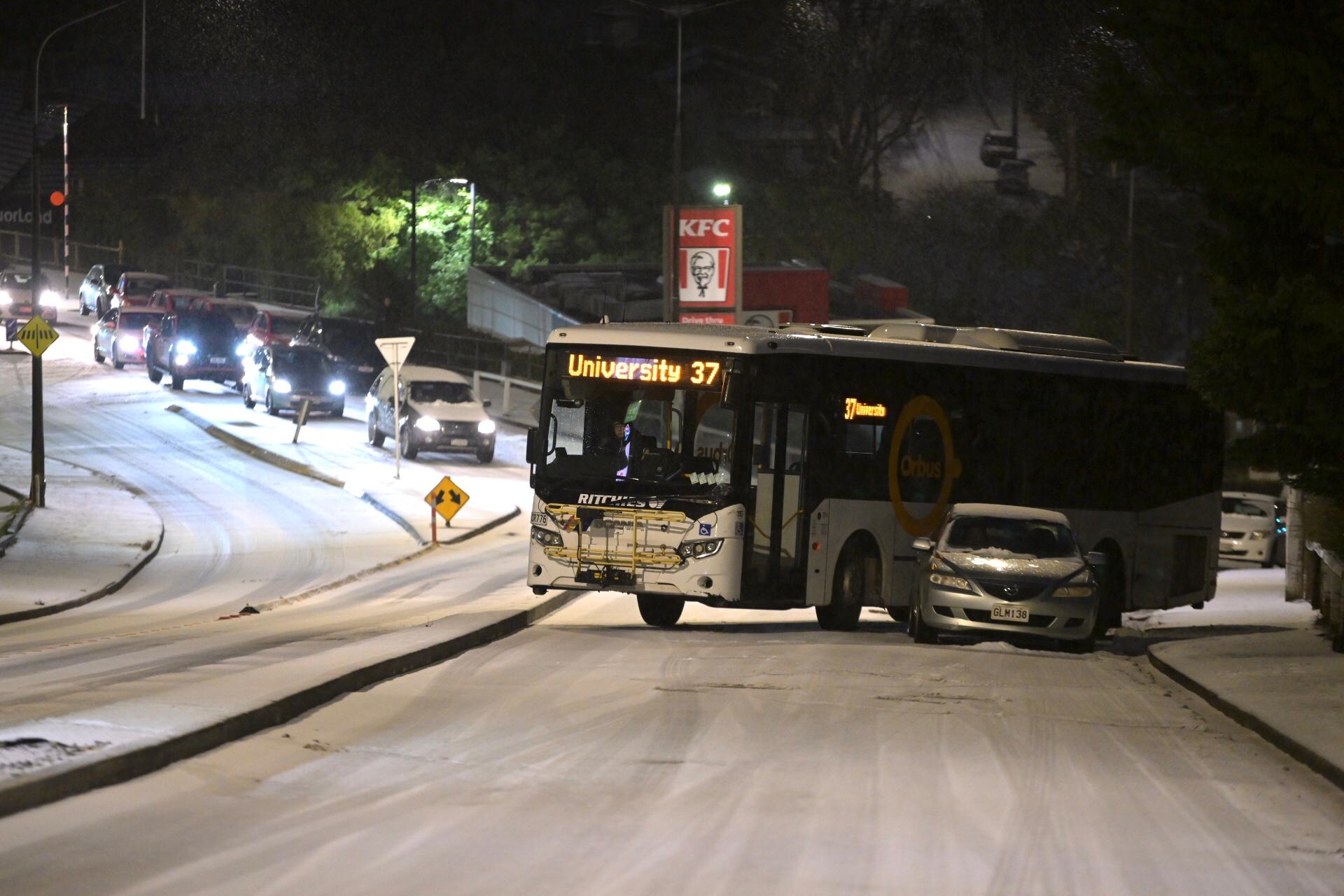 Highway closed and schools open late as snow hits Dunedin