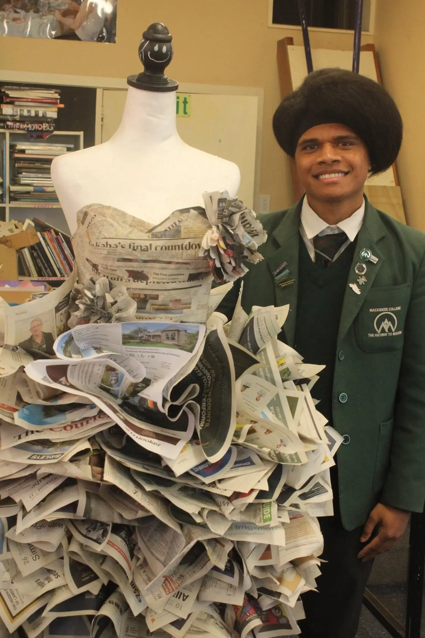 Anare Ravai created a two-piece garment out of discarded newspapers for the recent Junk to Funk competition. Photo: Supplied