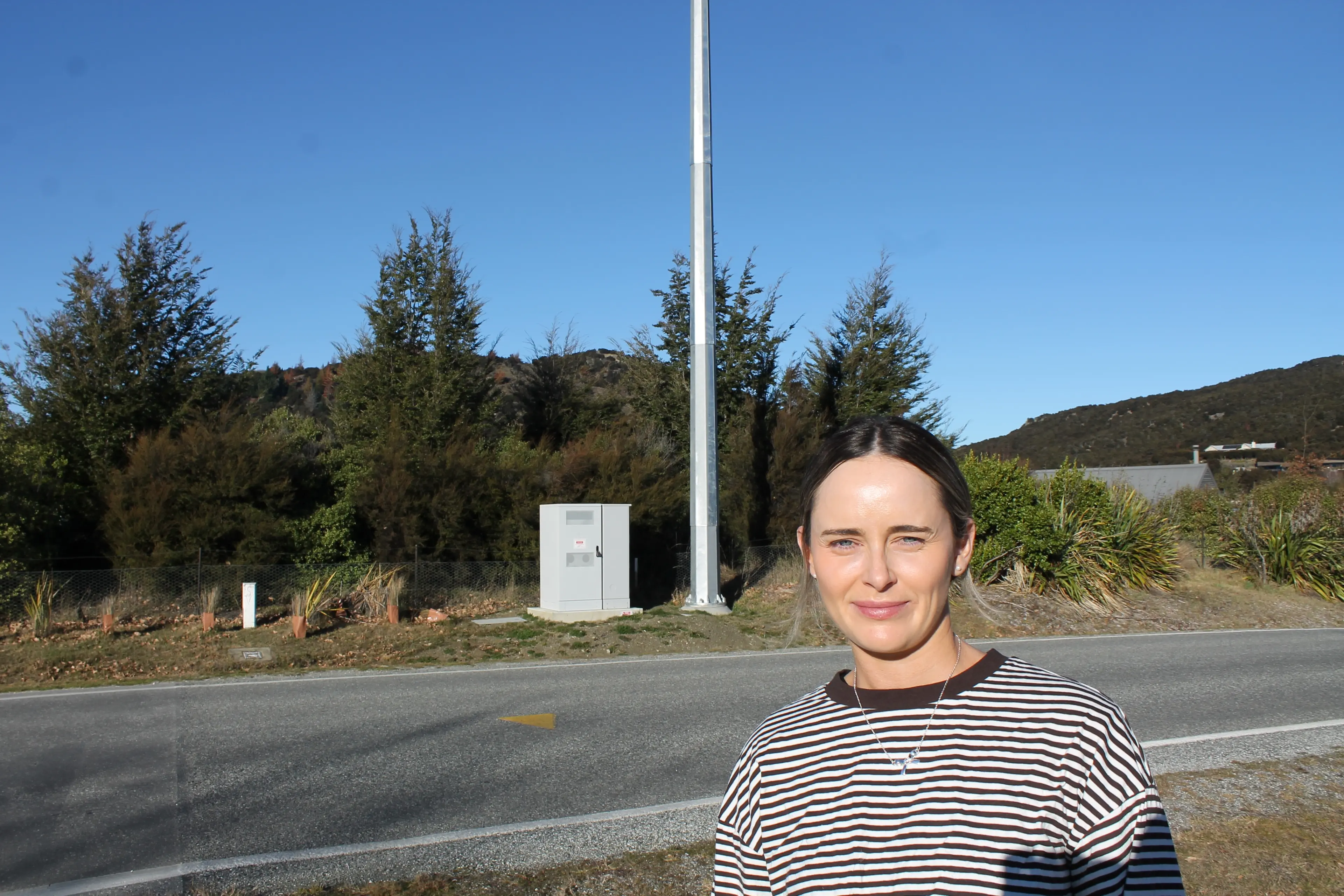Aleisha Hildred believes that the placement of a cellphone tower in front of a section she owned wiped $160,000 of its value, and warns that it could happen to anyone. Photo: Ruairi O\\'Shea