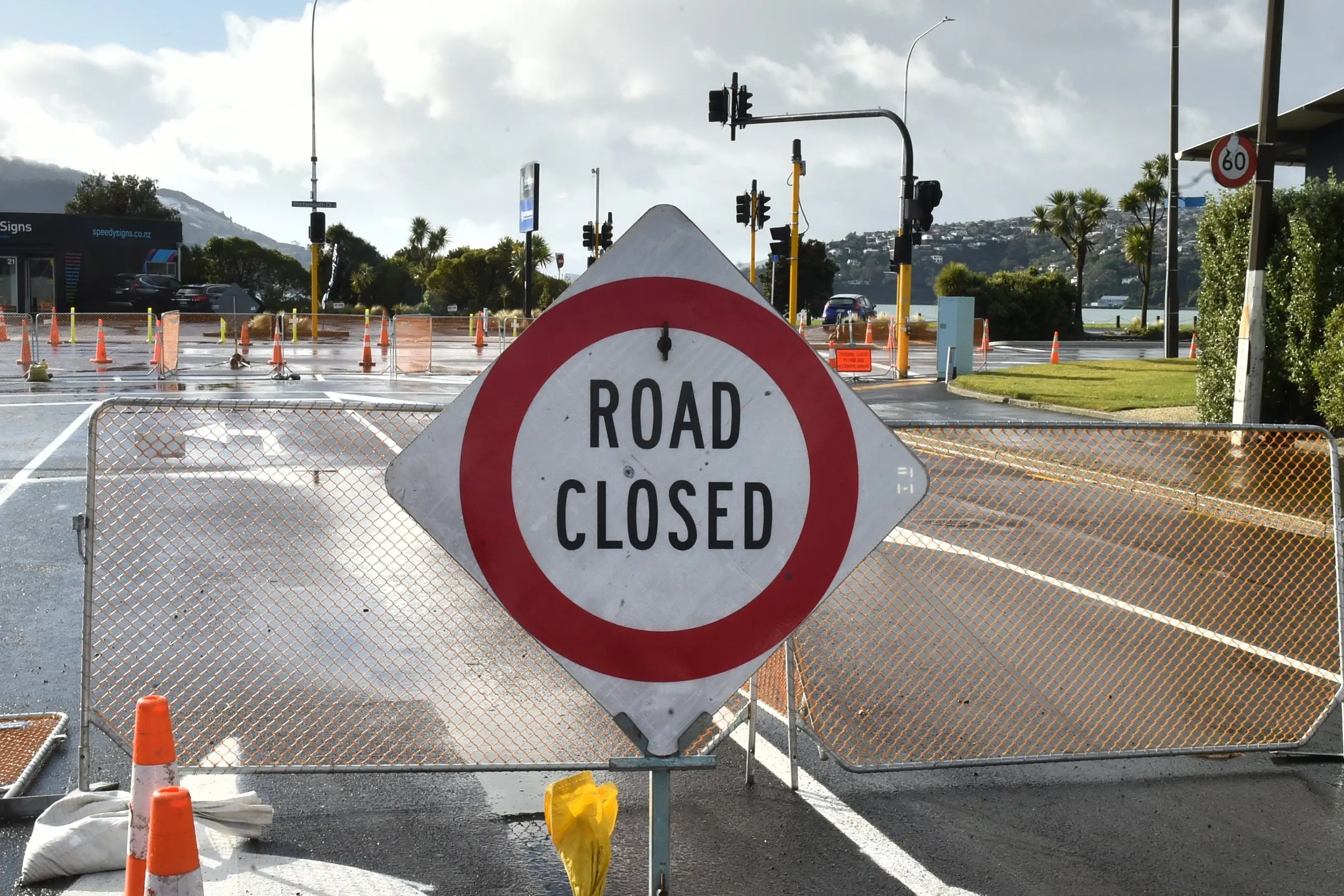 Not quite open yet is part of Strathallan St, approaching the intersection with Portsmouth Dr and Wharf St, Dunedin. It had been due to reopen on Tuesday, but snow in the city forced a day\\'s delay. Photo: Gregor Richardson