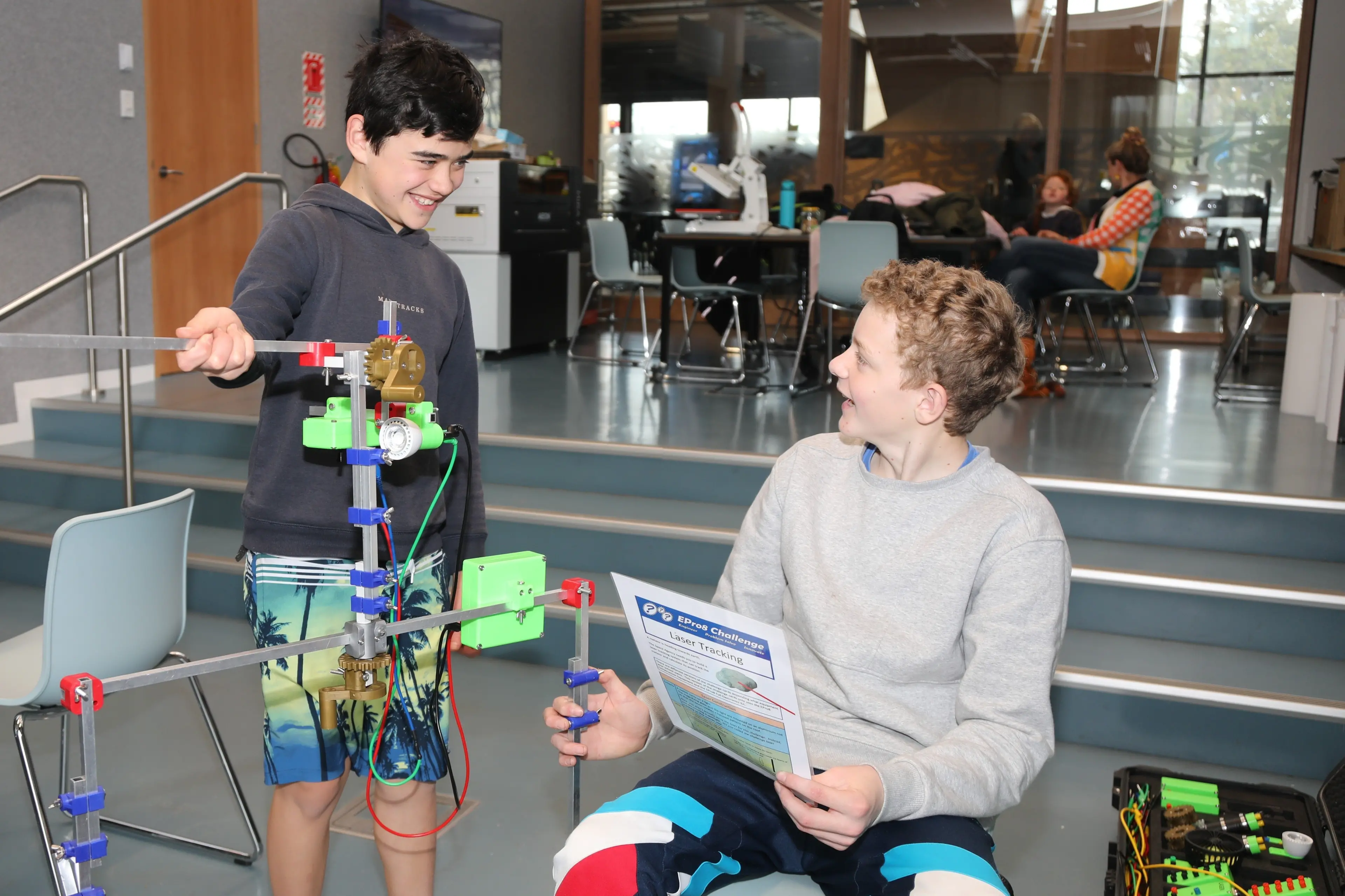 Home schooled Kymani Harris 11 Left, and Archie Scott 13 at the Ashburton Library practicing on the new electronic EPro Kit. Photo Heather Mackenzie