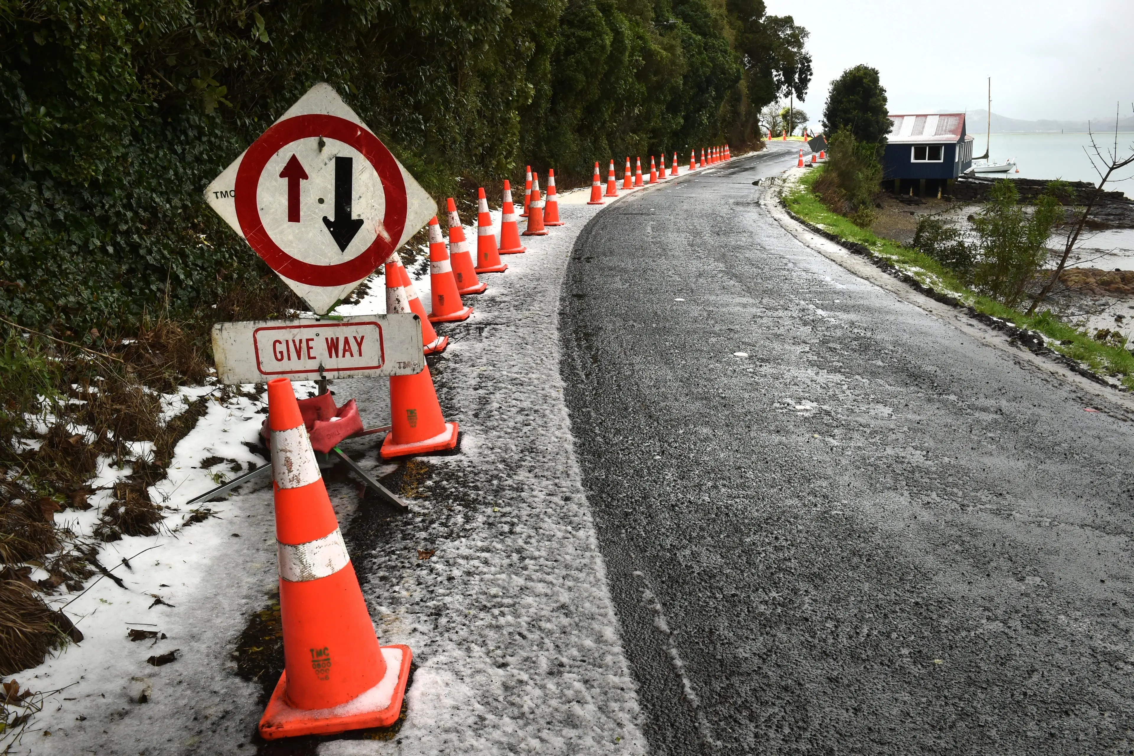 Road cones blocking a lane of Aramoana Rd, Careys Bay, which have been the source of frustration for residents. Photo: Gregor Richardson