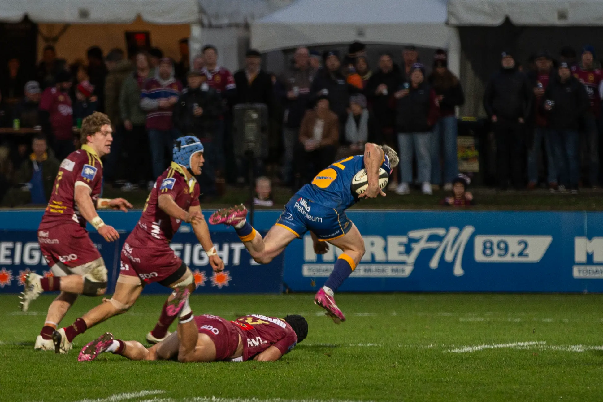 Otago second five Jake Te Hiwi hurdles Southland fullback Glen Vaihu while attacking the Stags tryline. Photo: DARYLL WINTER PHOTOGRAPHY