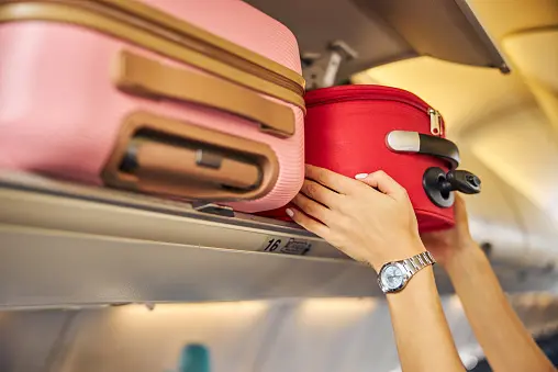 JetStar is moving to a size-based carry-on baggage model and a fee to use the overhead lockers. Photo: Getty Images