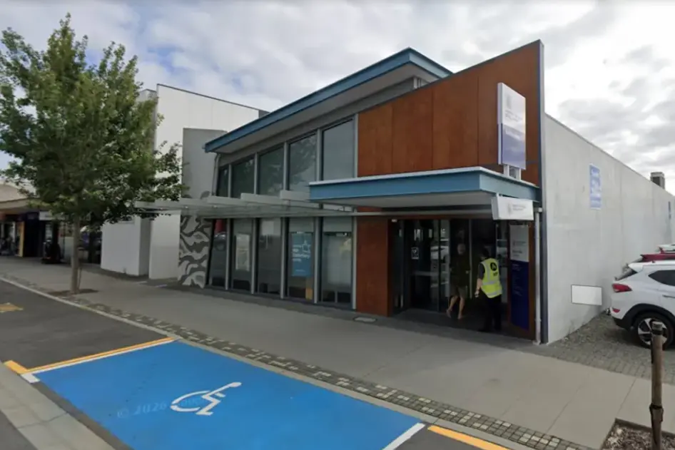 A security guard outside the Ashburton Work and Income office. Photo: Google Maps