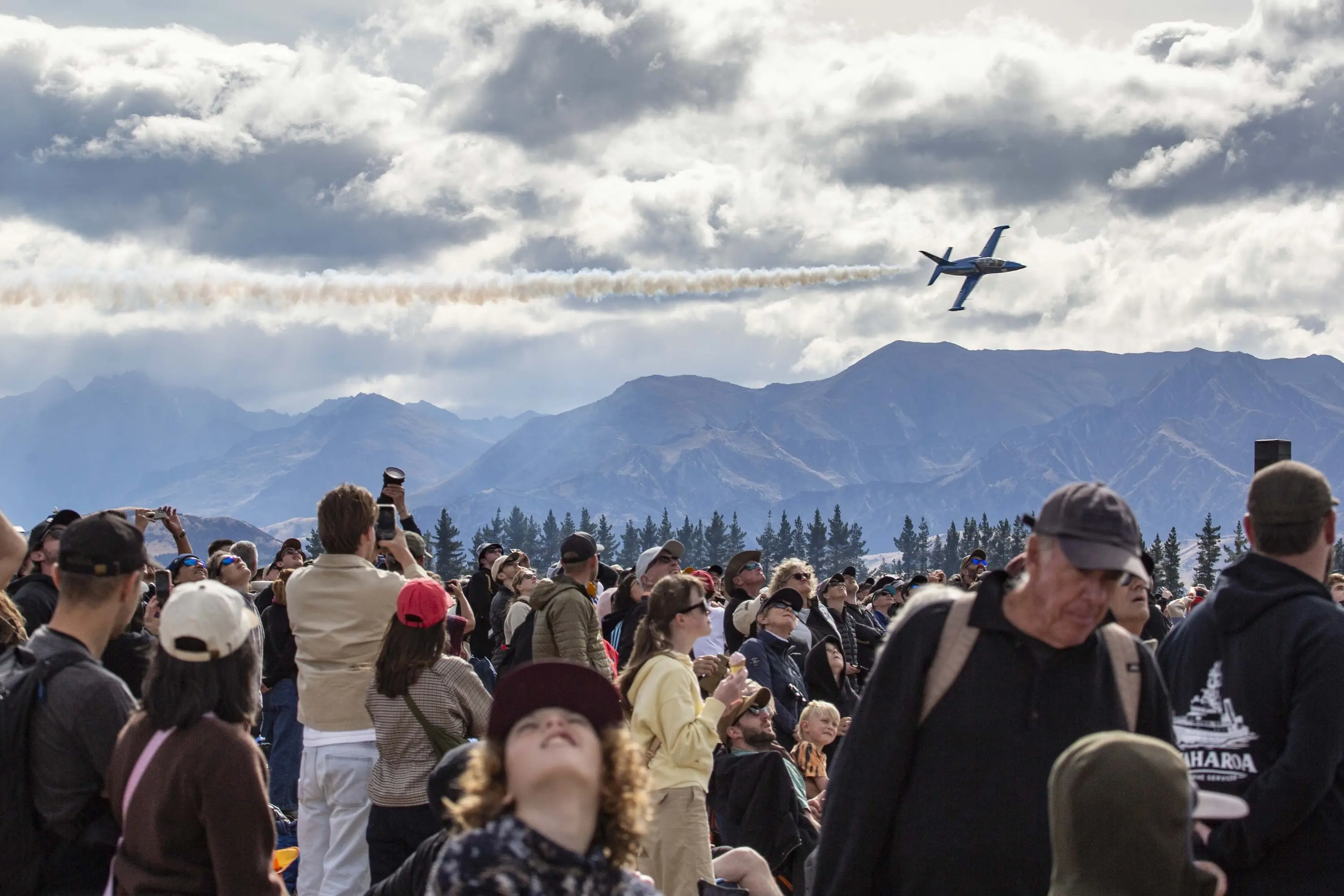 Attendees watch an Aero L-39 Albatross at Warbirds Over W\\u0101naka, with this year\\'s event named the country\\'s favourite event at the New Zealand Event Awards. Photo: Geoff Marks